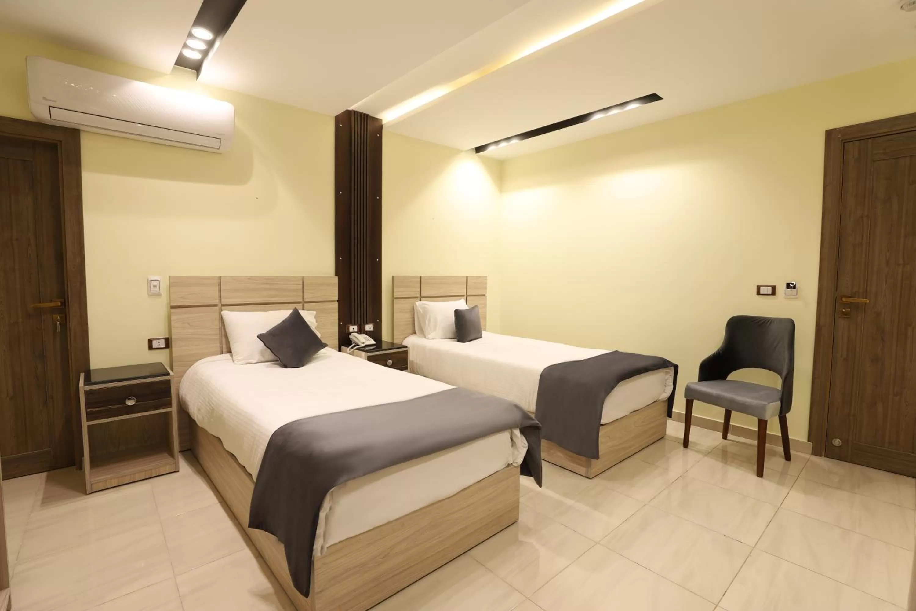 Bed in Brothers Pyramids View Hotel