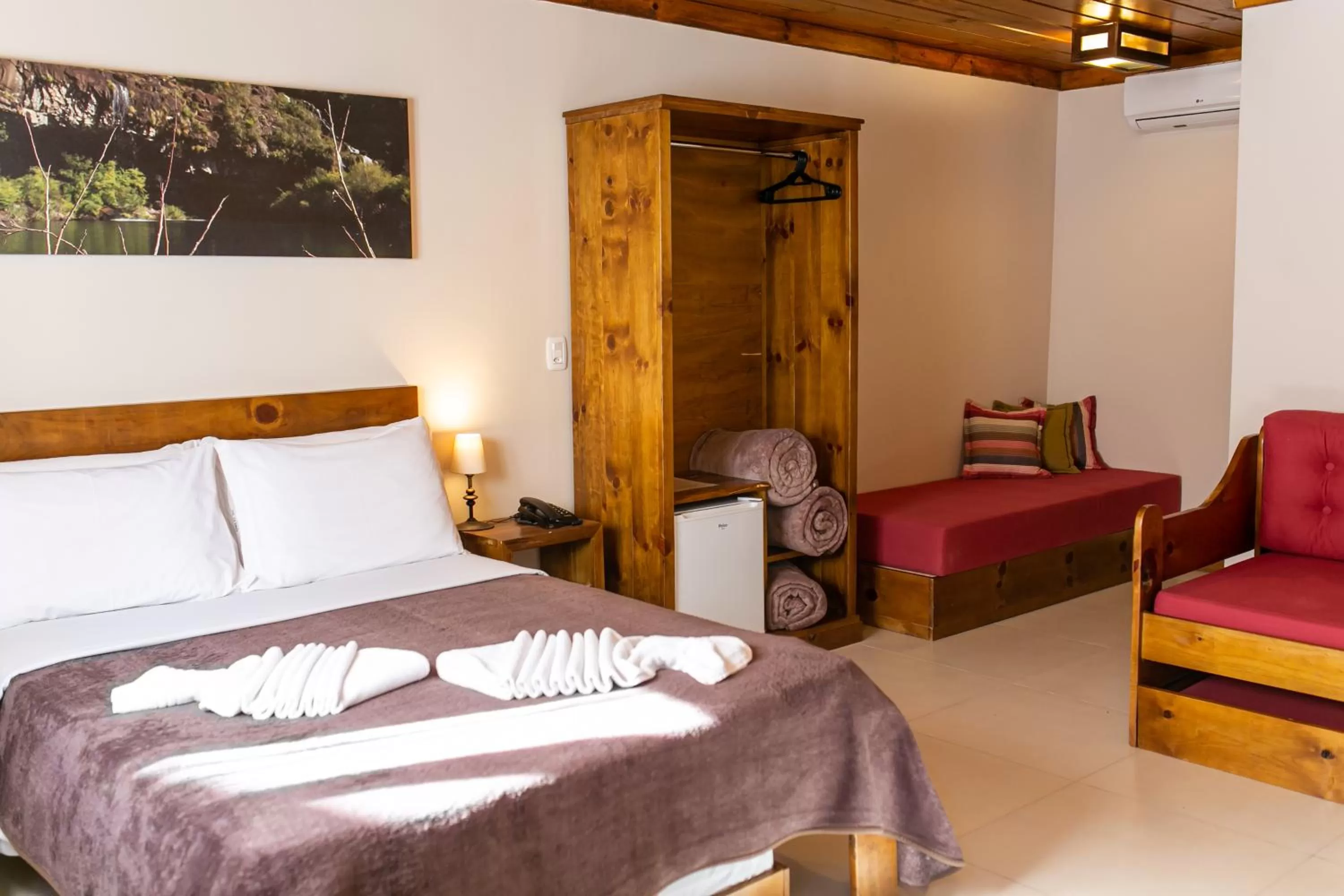 Bed in Pousada Charm Canela