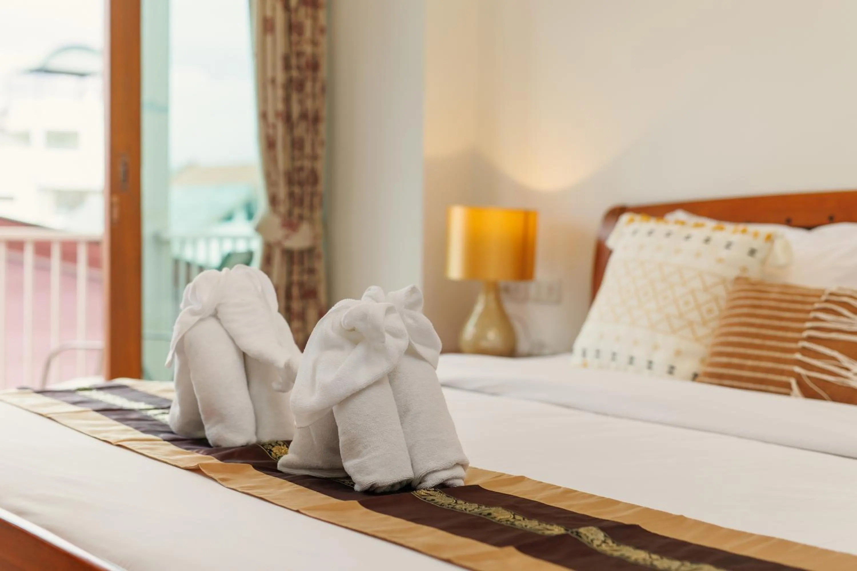 Bed in Rendezvous Classic House