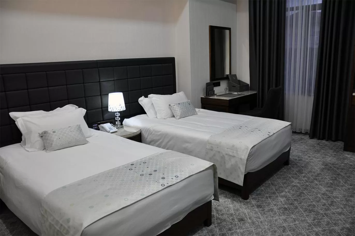 Bed in Parliament Palace Hotel