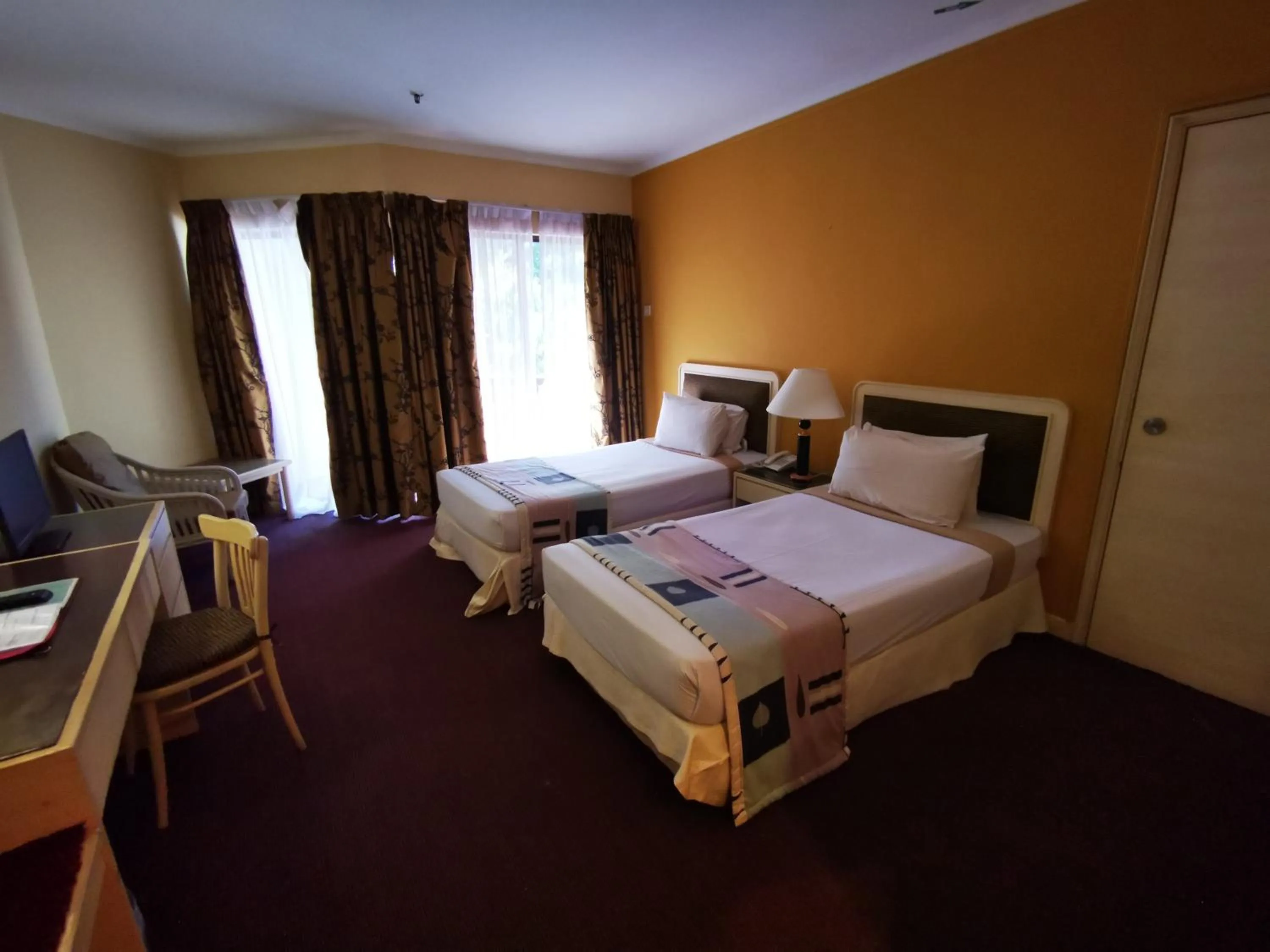 Photo of the whole room, Bed in The Grand Beach Resort Port Dickson