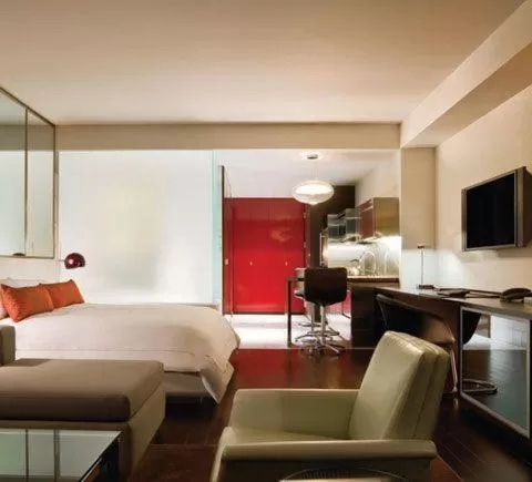 Living room, Bed in Palms Place Studio with Balcony & Strip View