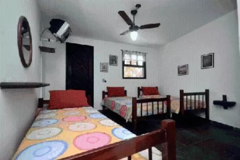 Bed in Pousada A Marca do Faraó