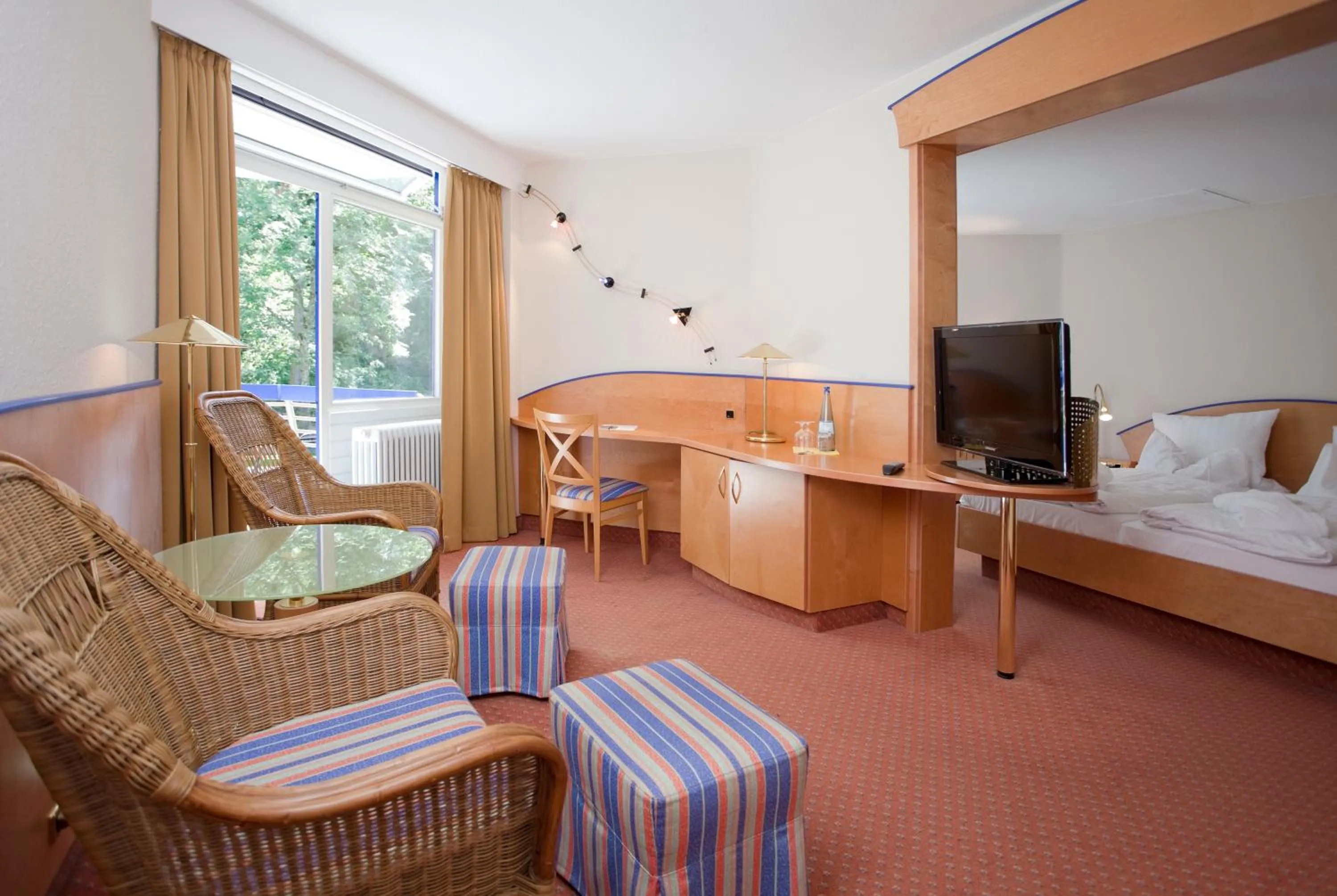 Living room, Bed in Fini-Resort Badenweiler