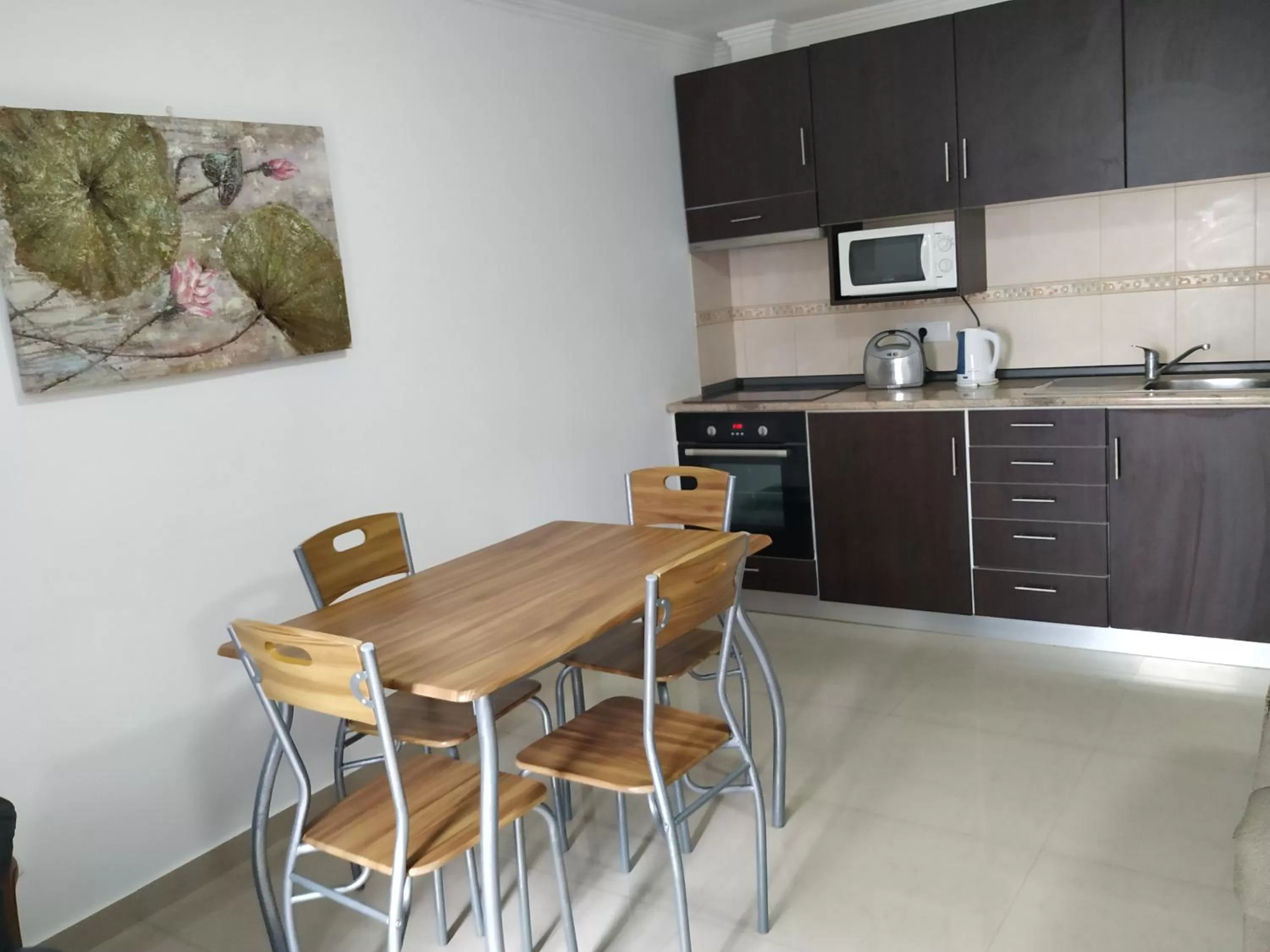 Kitchen/Kitchenette in Costa & Isaias Apartamentos