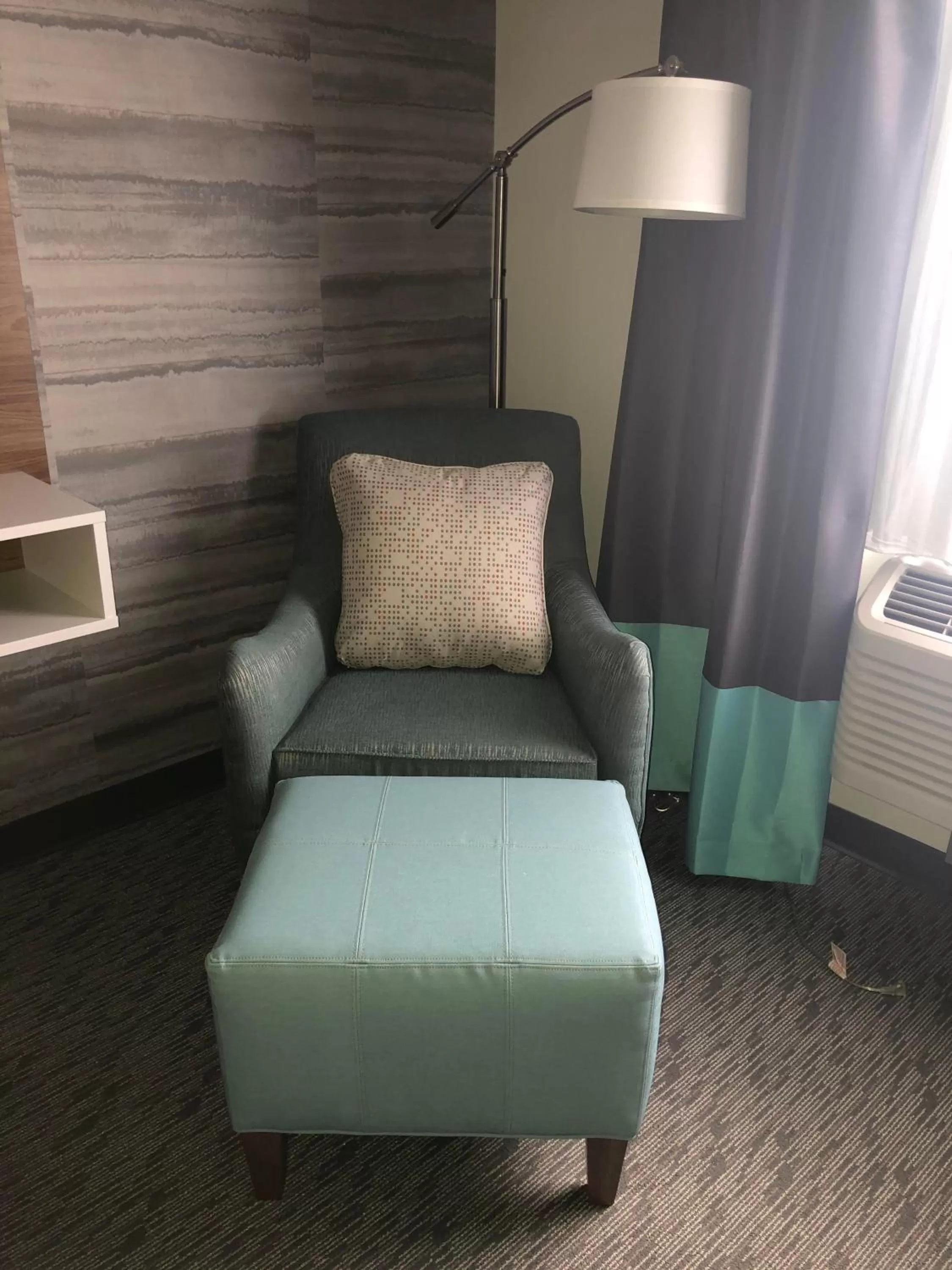 Seating area in Super 8 by Wyndham Manchester Airport