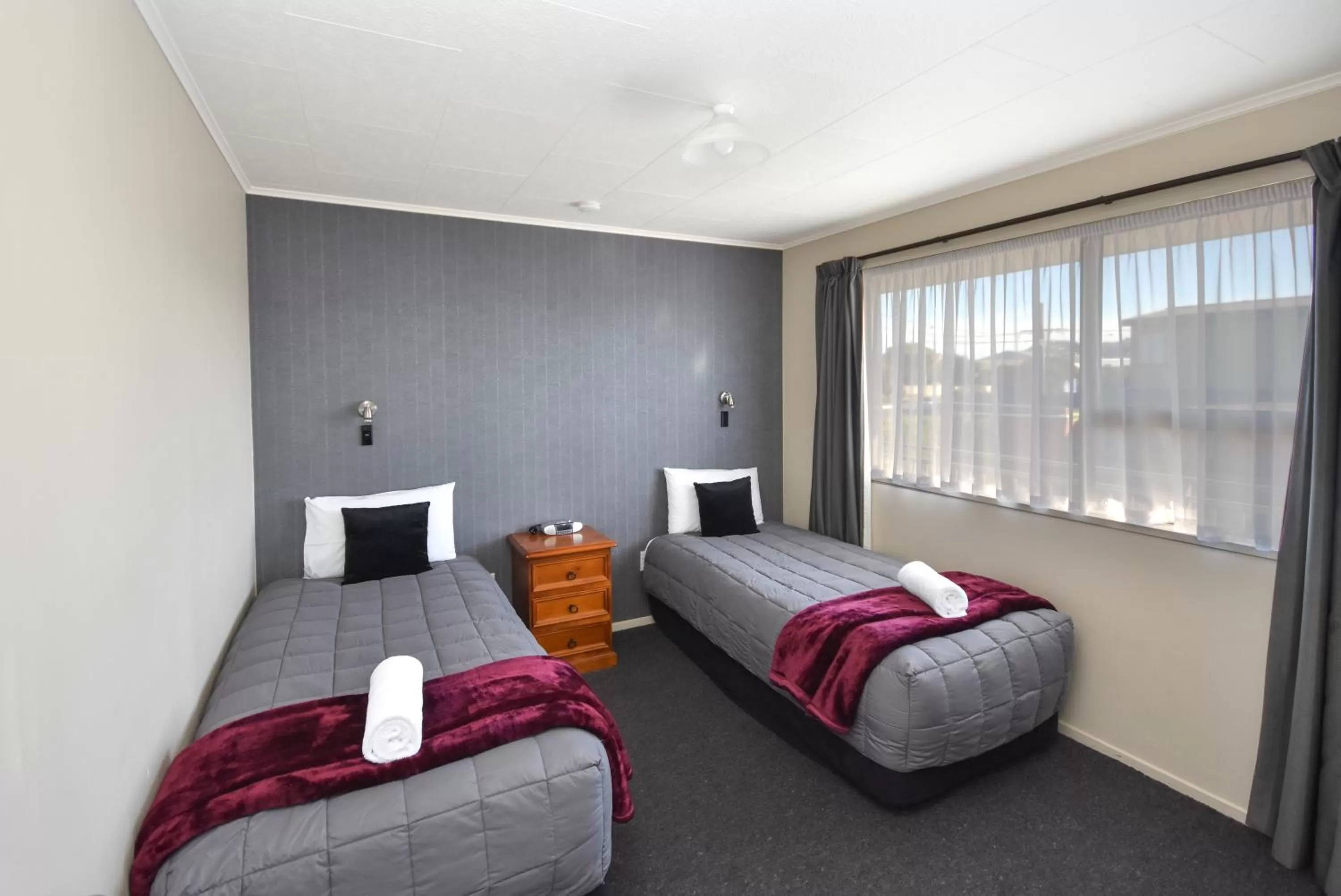 Bed in ASURE Adrian Motel