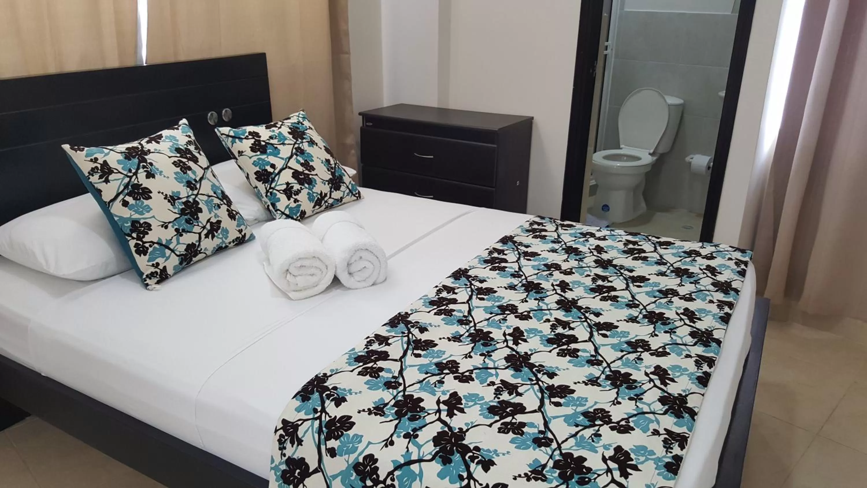 Bed in Caribbean Island Hotel Piso 2