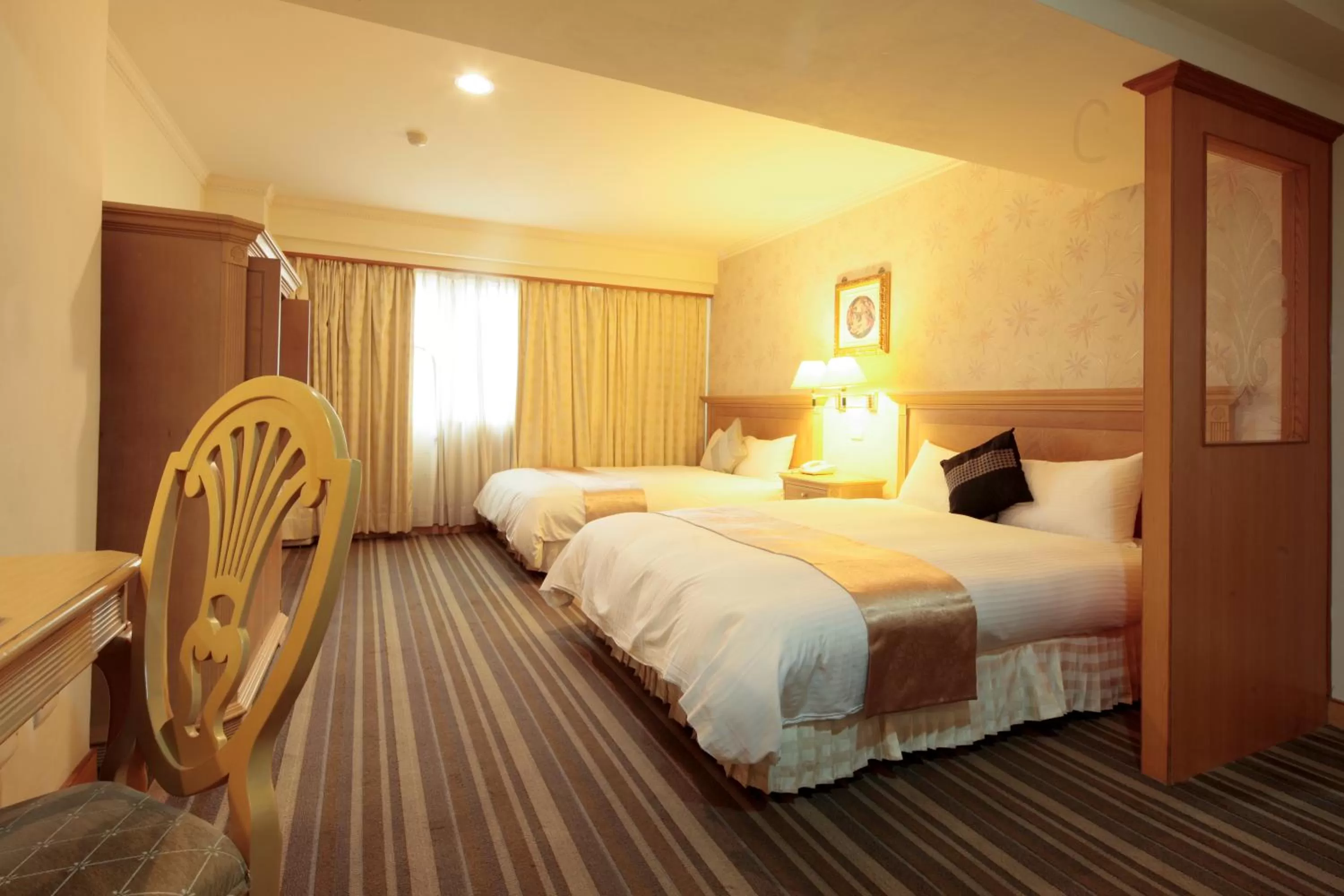 Bed in Cambridge Tainan Hotel