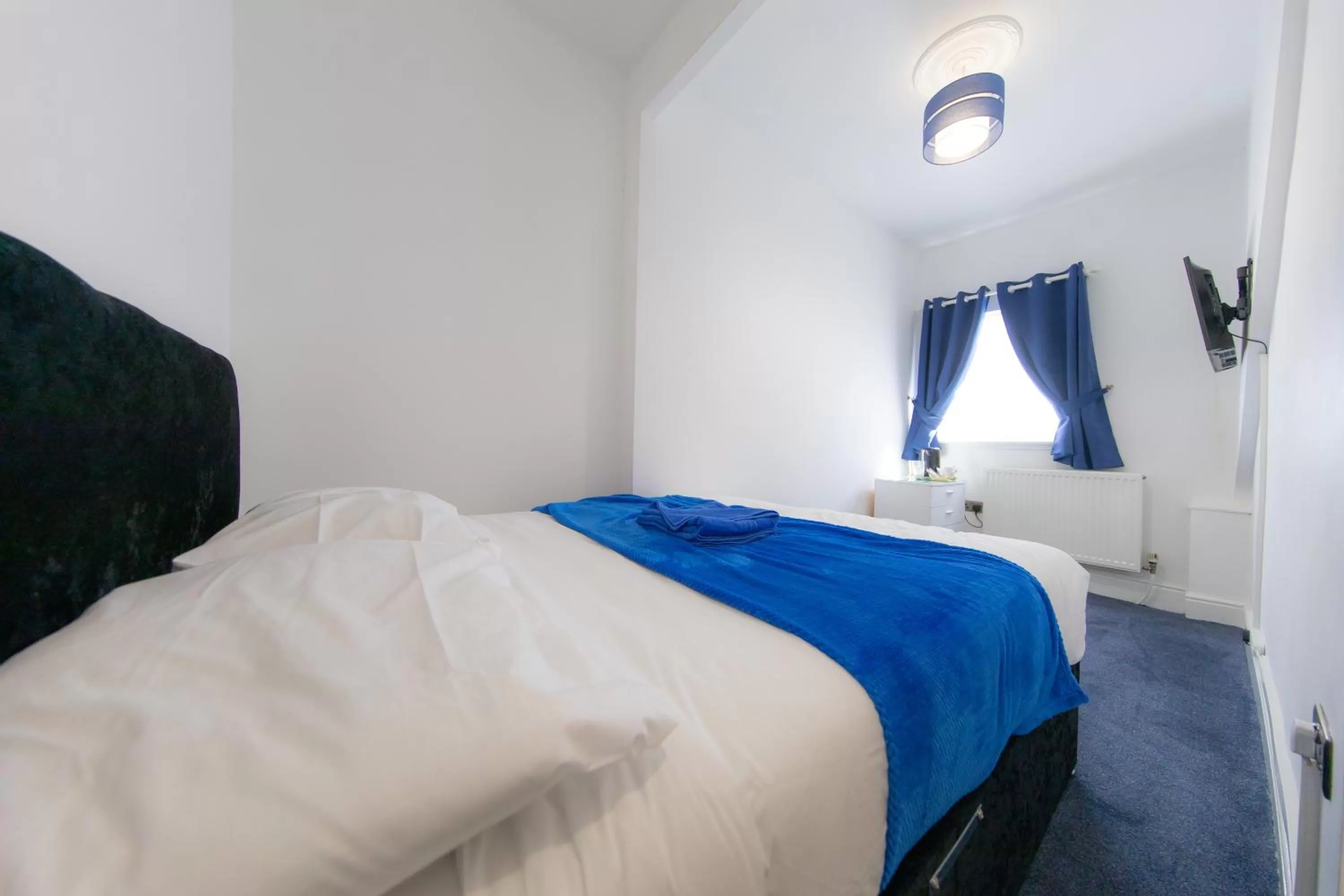 Bed in The Adonis Hotel