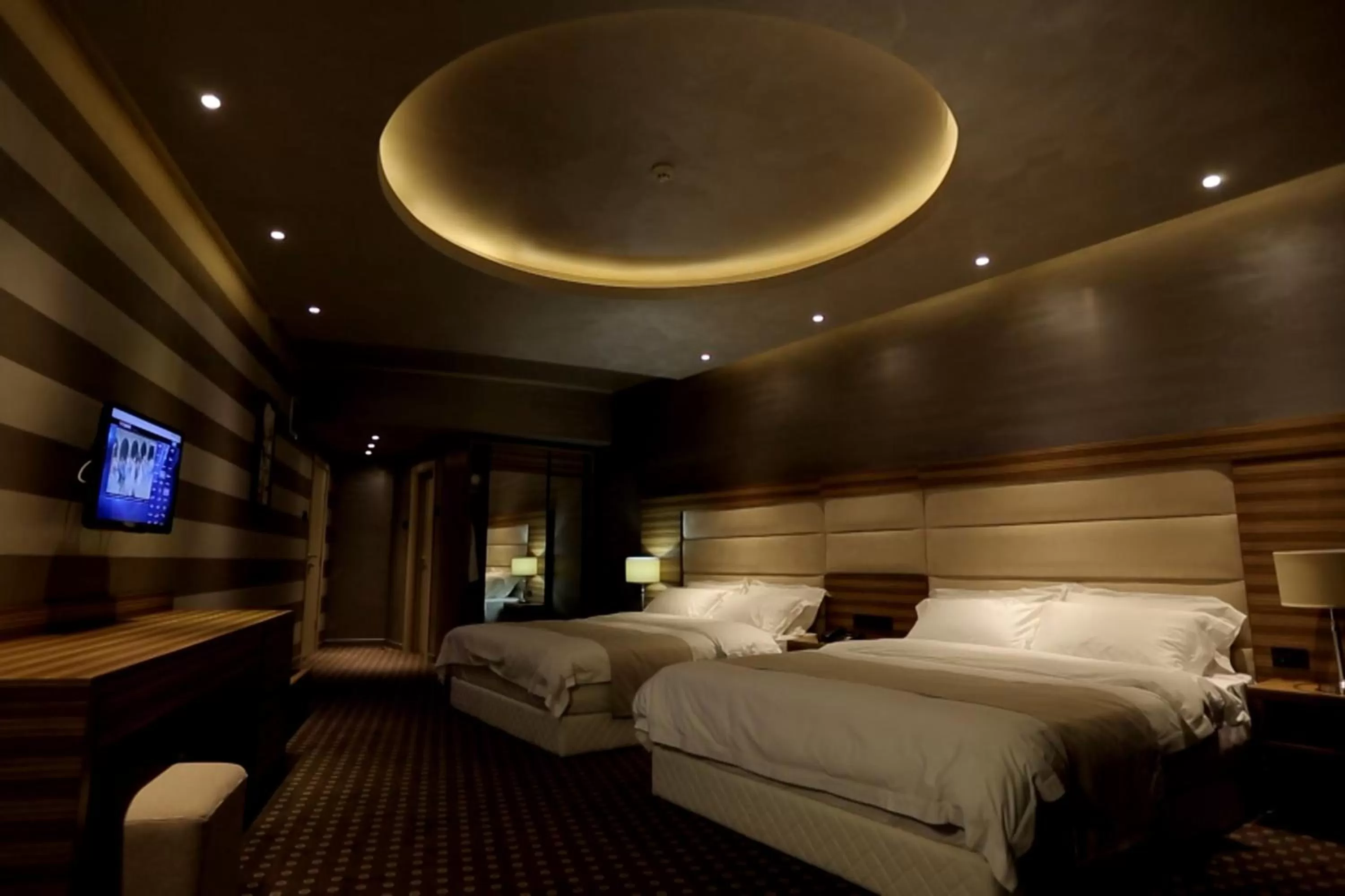 Bed in Orbis Design Hotel & Spa