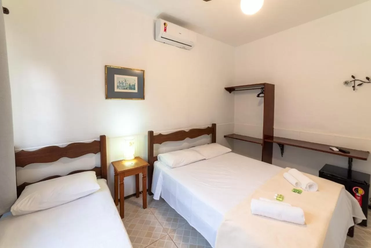 Bed in Pousada Portal de Paraty