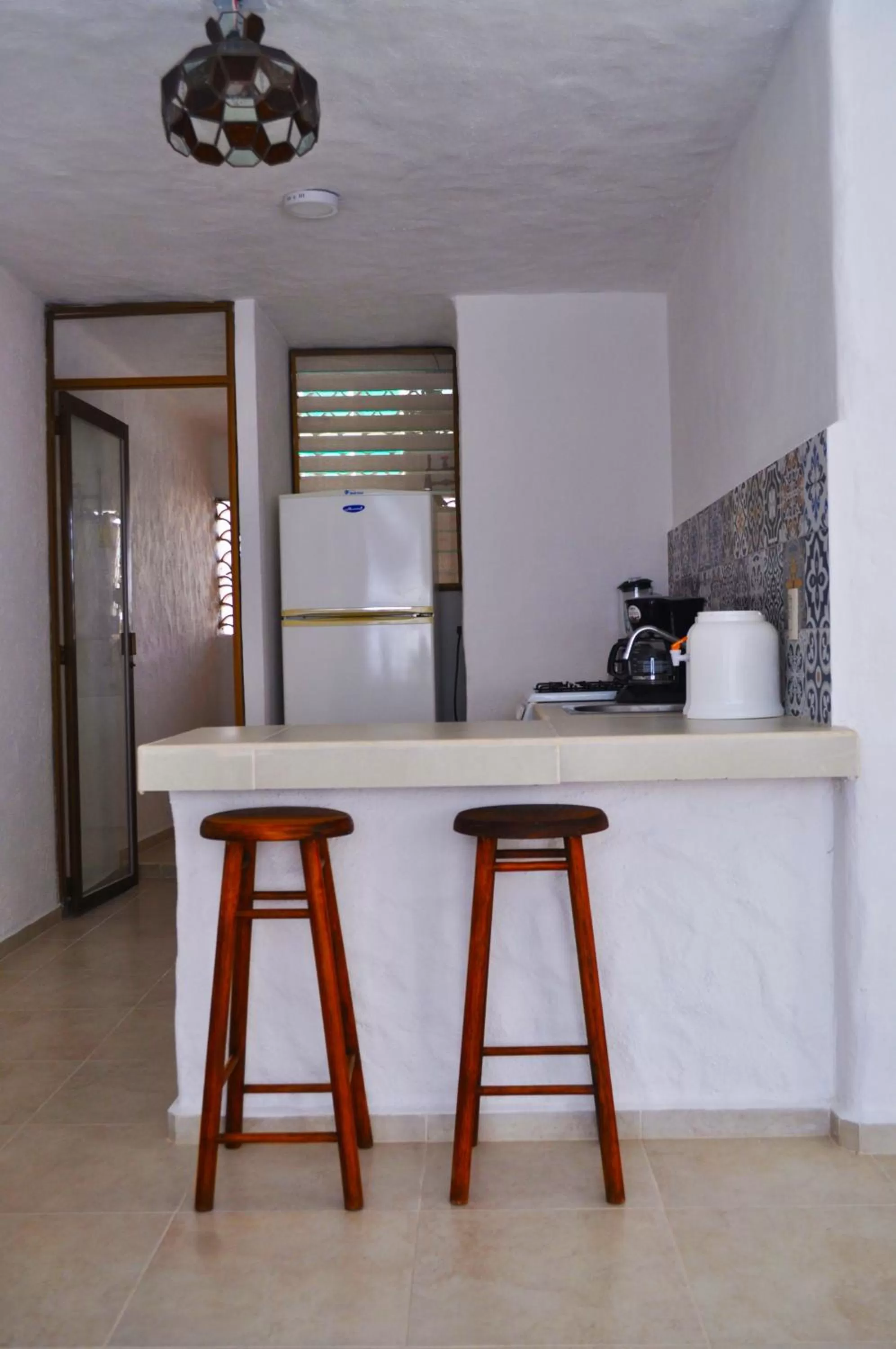 Kitchen or kitchenette in Petit Hotel Pilitas