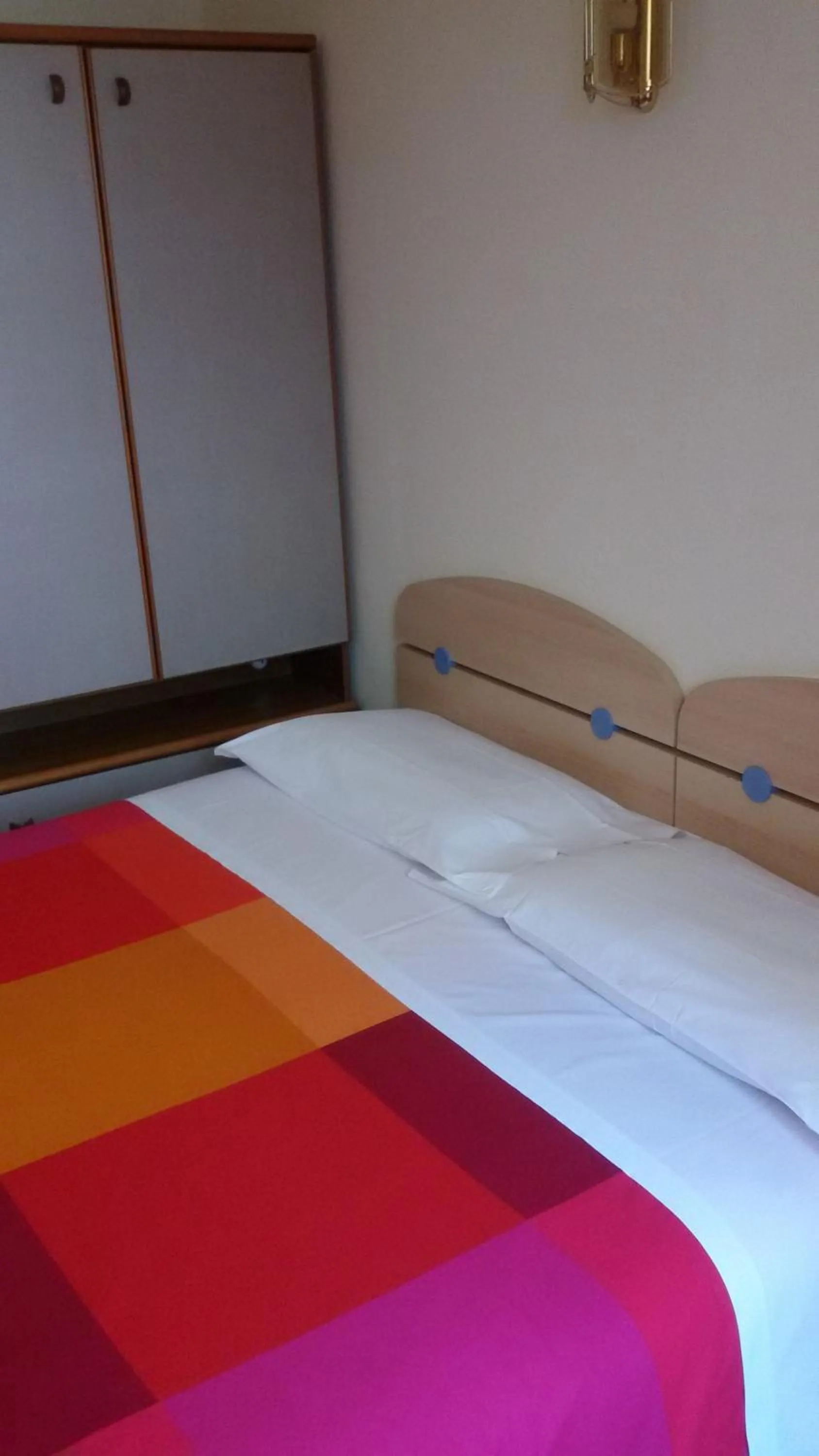 Bed in Albergo Luca