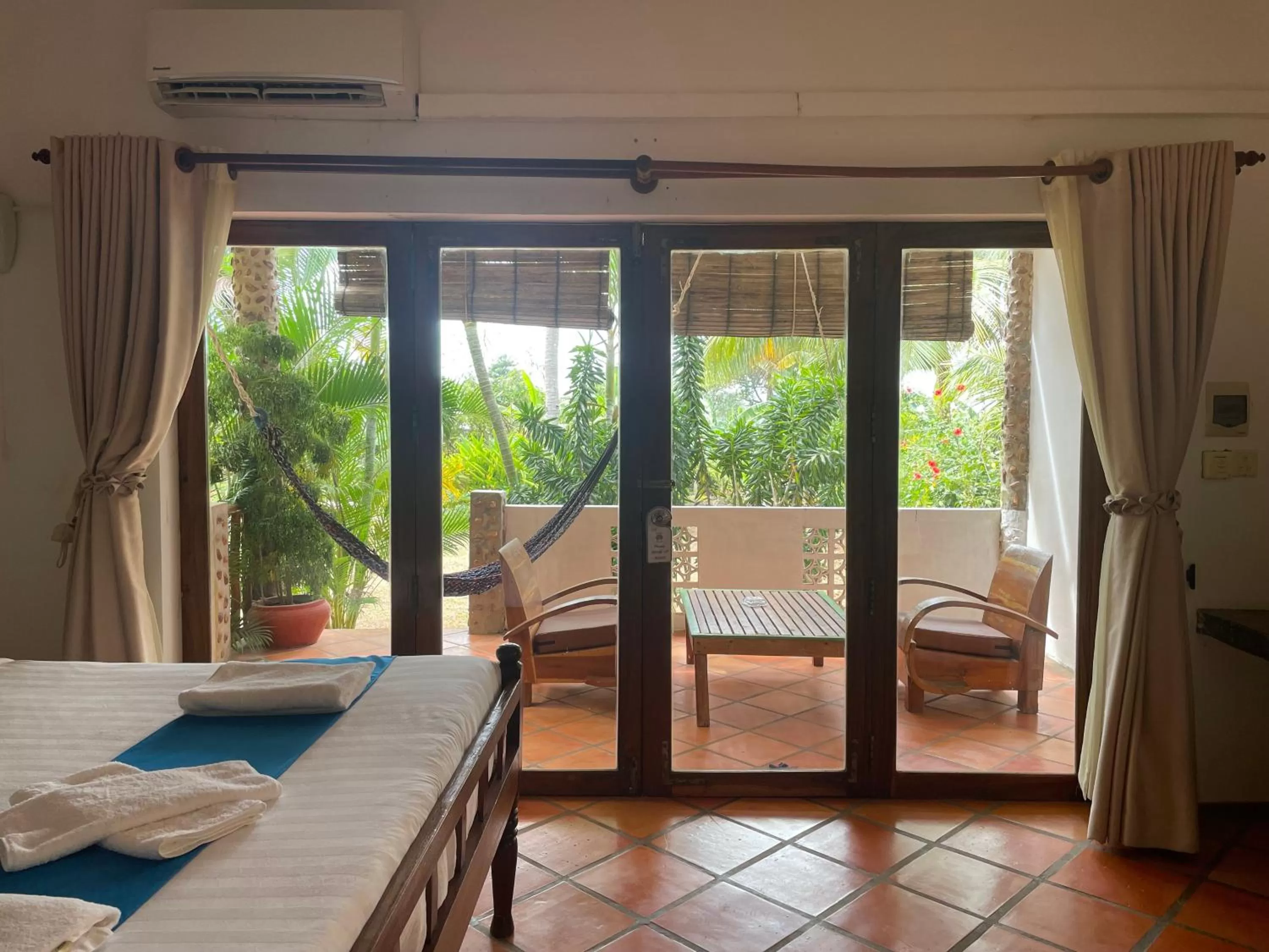Quadruple Room with Garden View in Kep Lodge