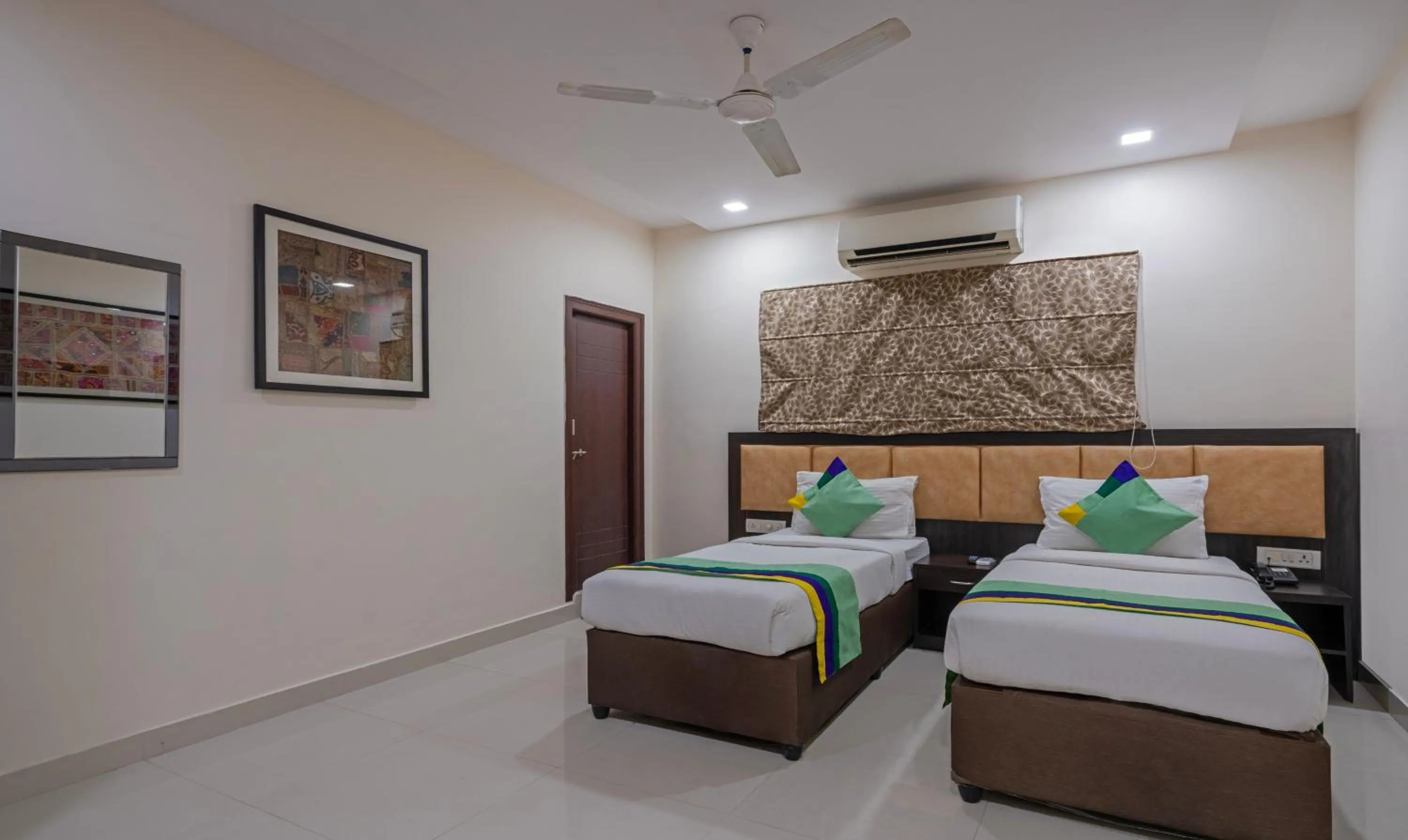 Bedroom, Bed in Treebo Emerald