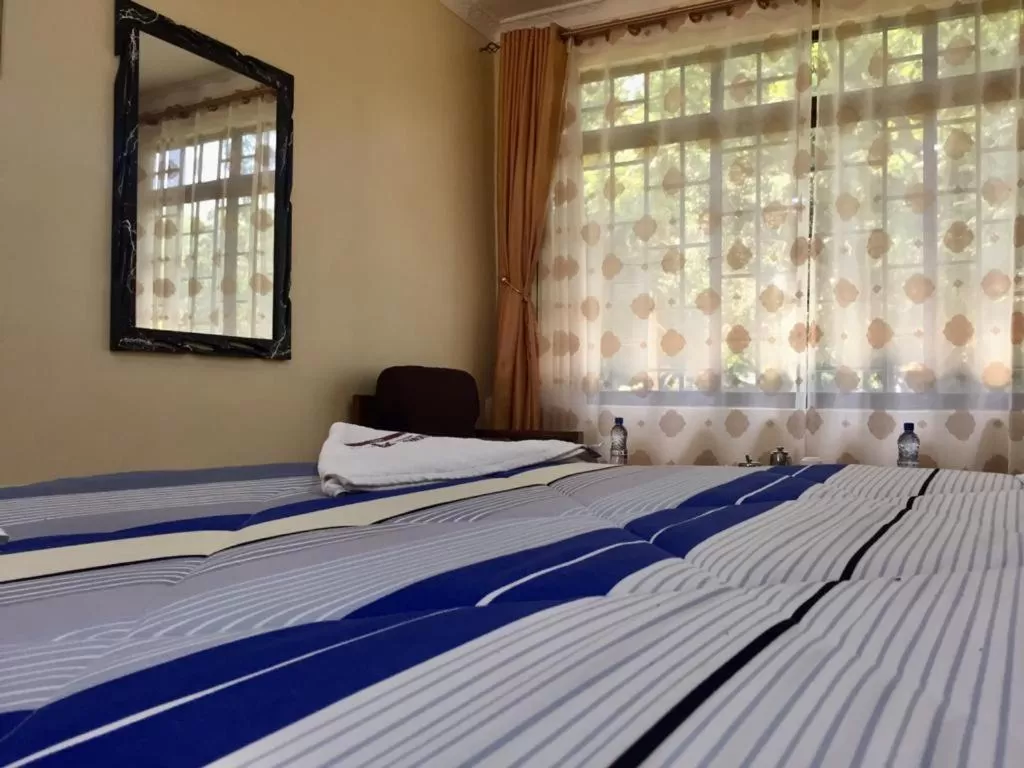 Bed in Vienna Woods Hotel Nakuru