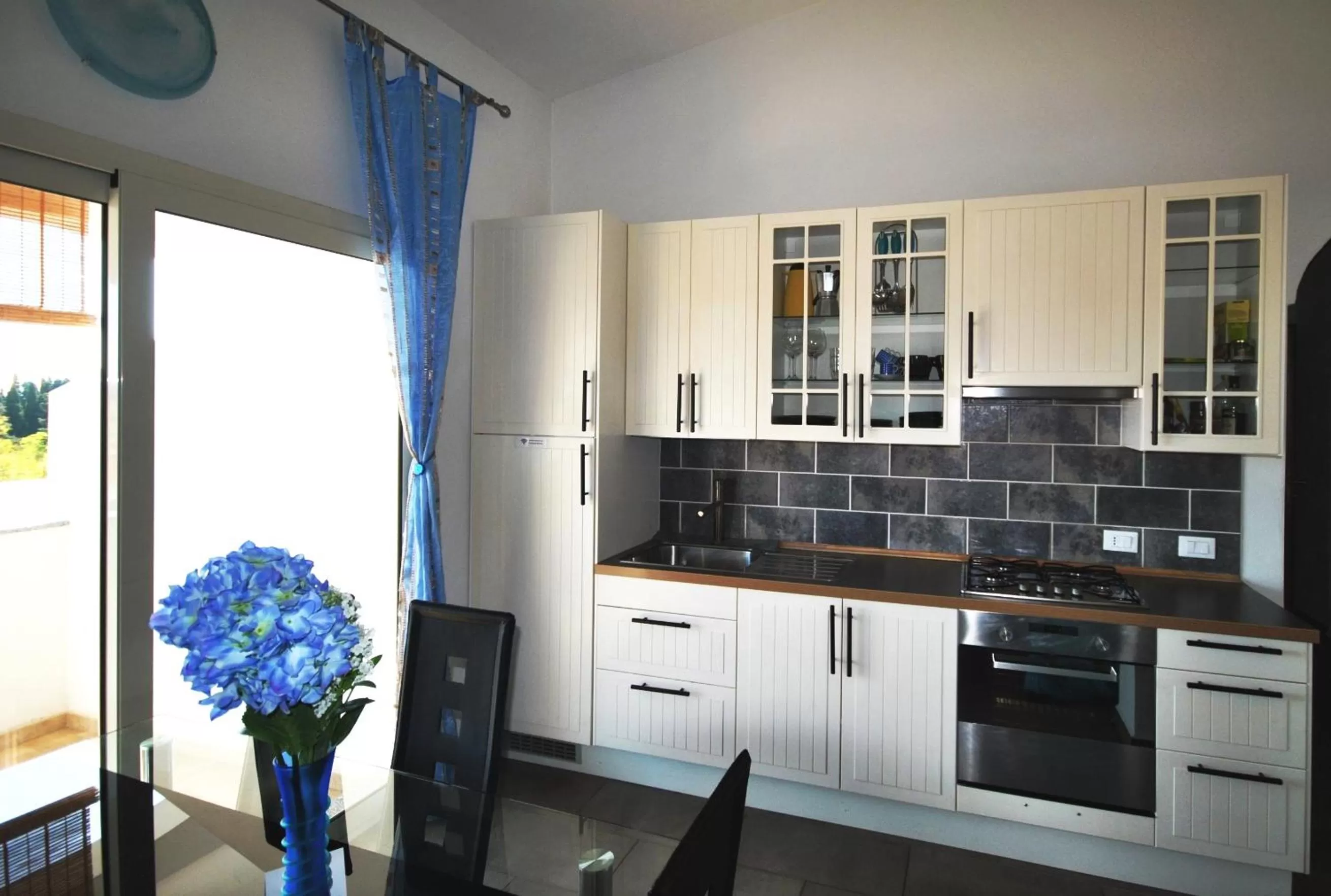 Kitchen or kitchenette in Holiday Residence Rifugio