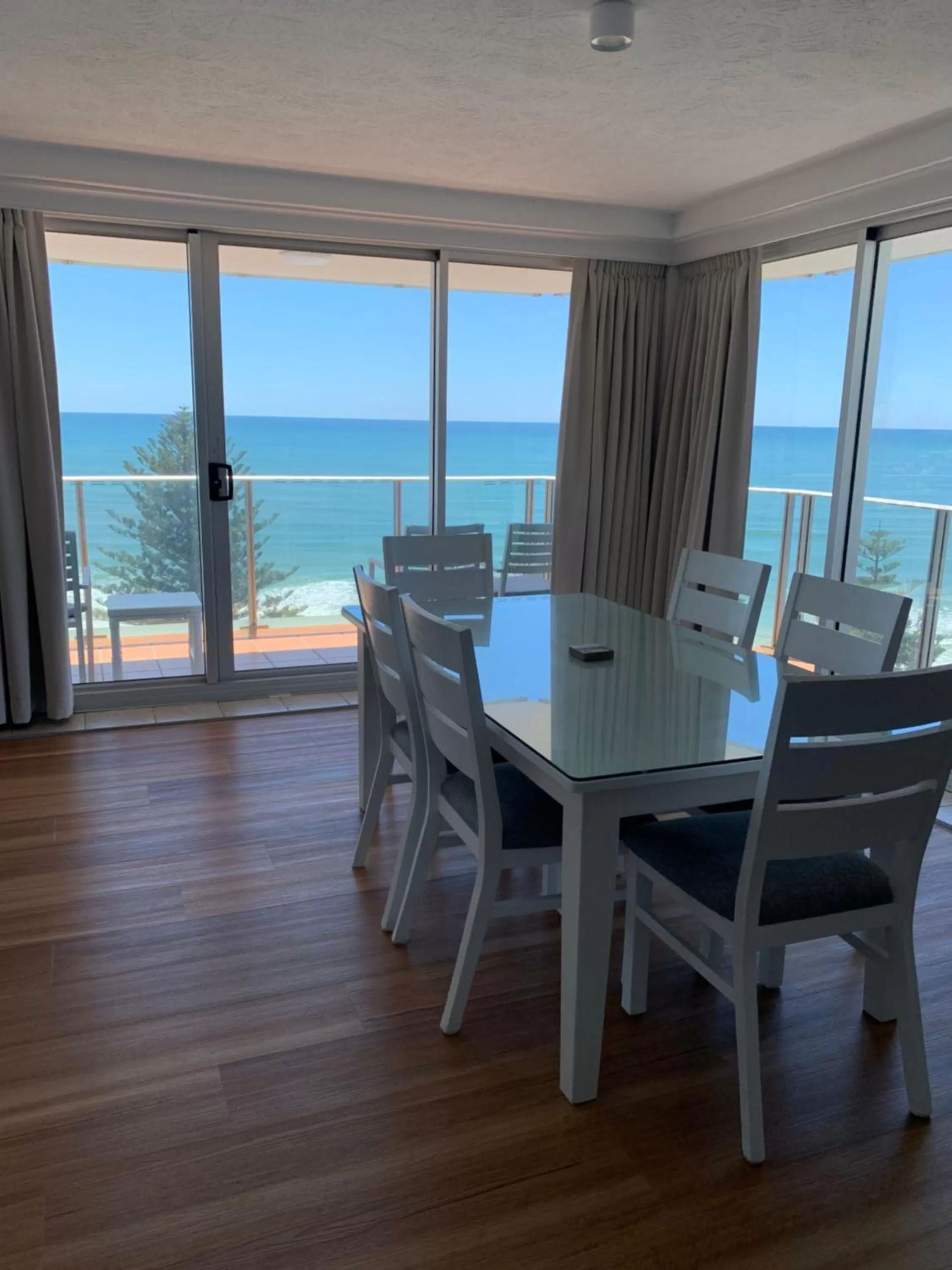 Dining area in Pacific Regis Beachfront Holiday Apartments