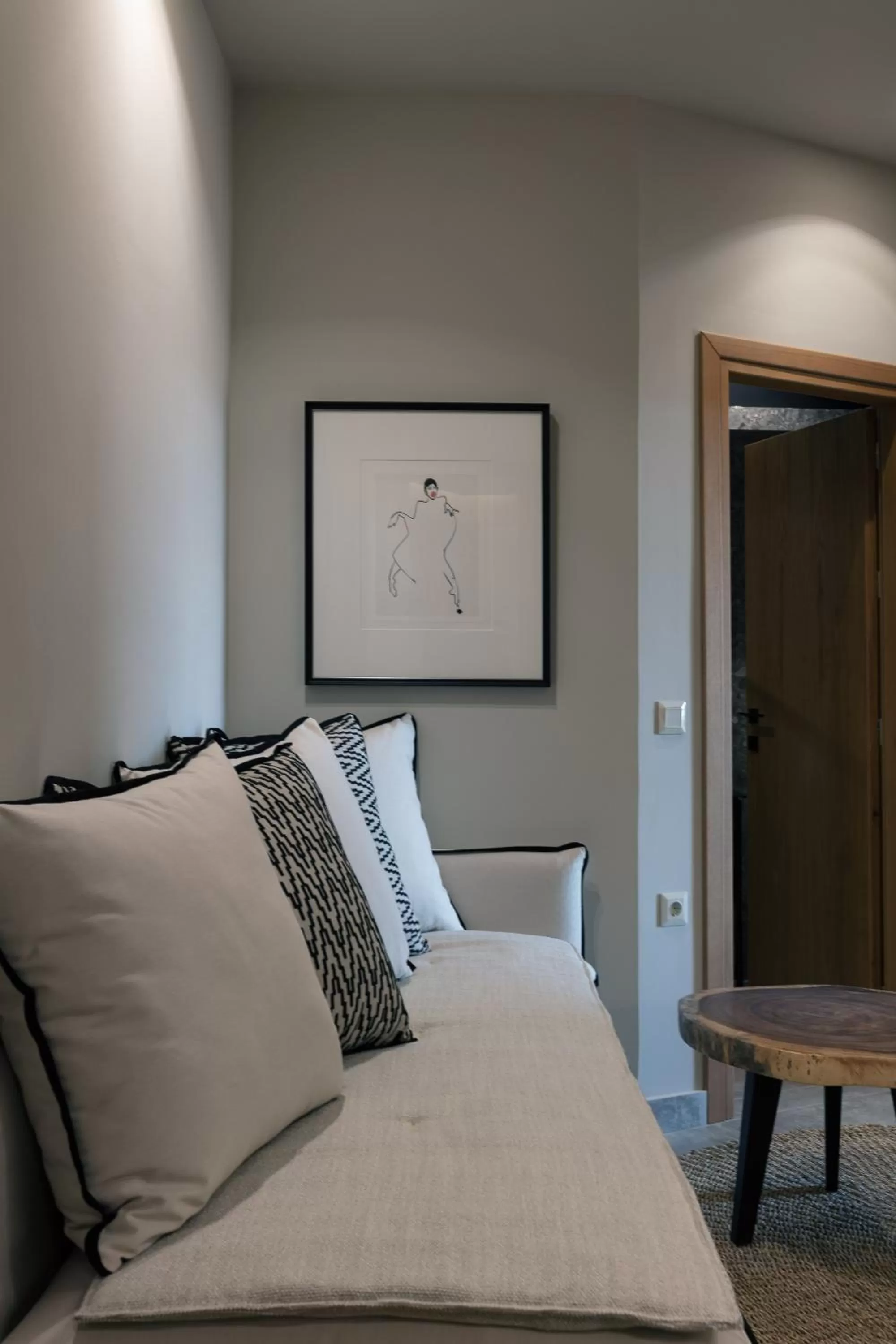 Seating area, Bed in Chapter 02 Gallery Suites