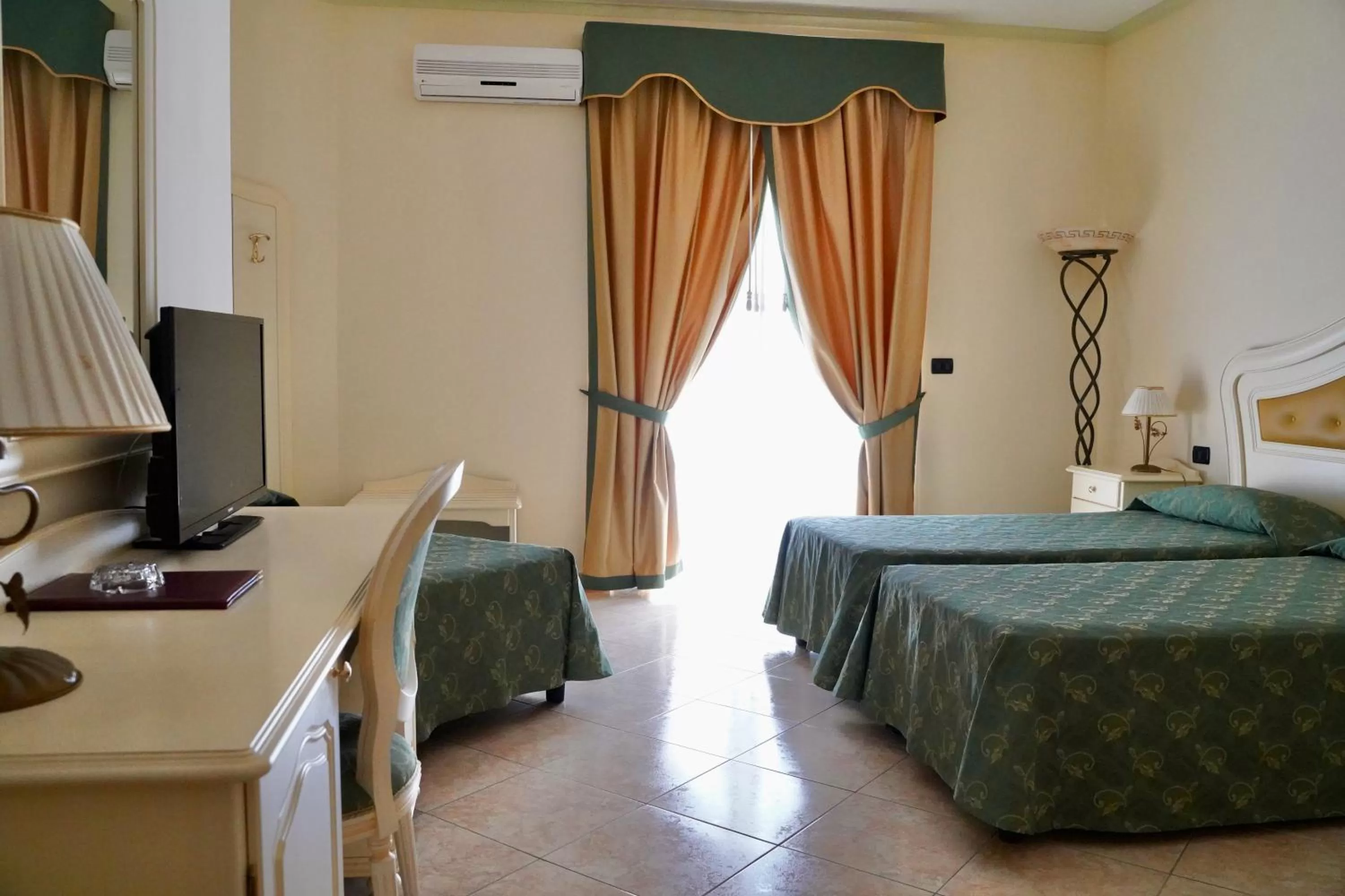 Bedroom in Hotel Roscianum Welness SPA