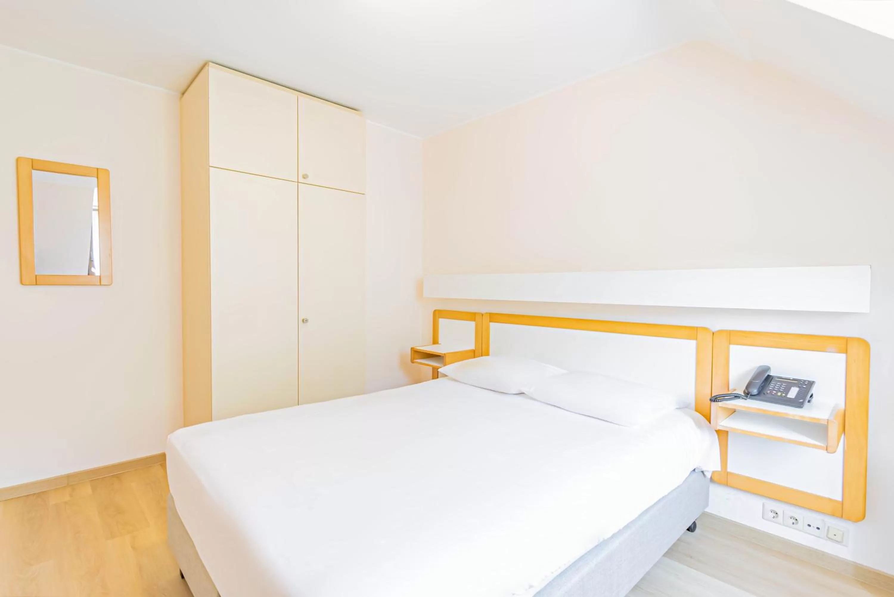 Bed in Hotel Le Postillon