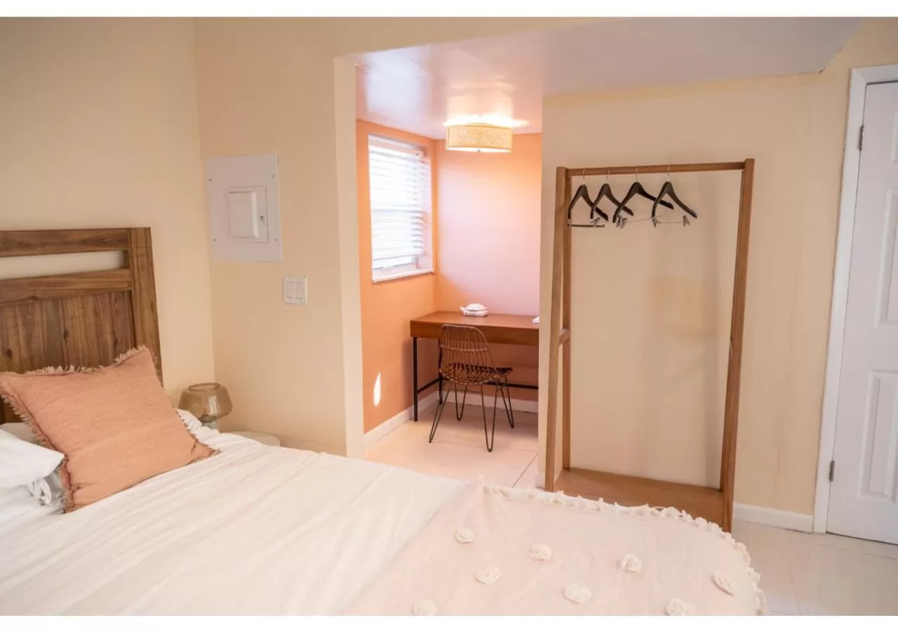 Bed in Miami River Inn by Renzzi