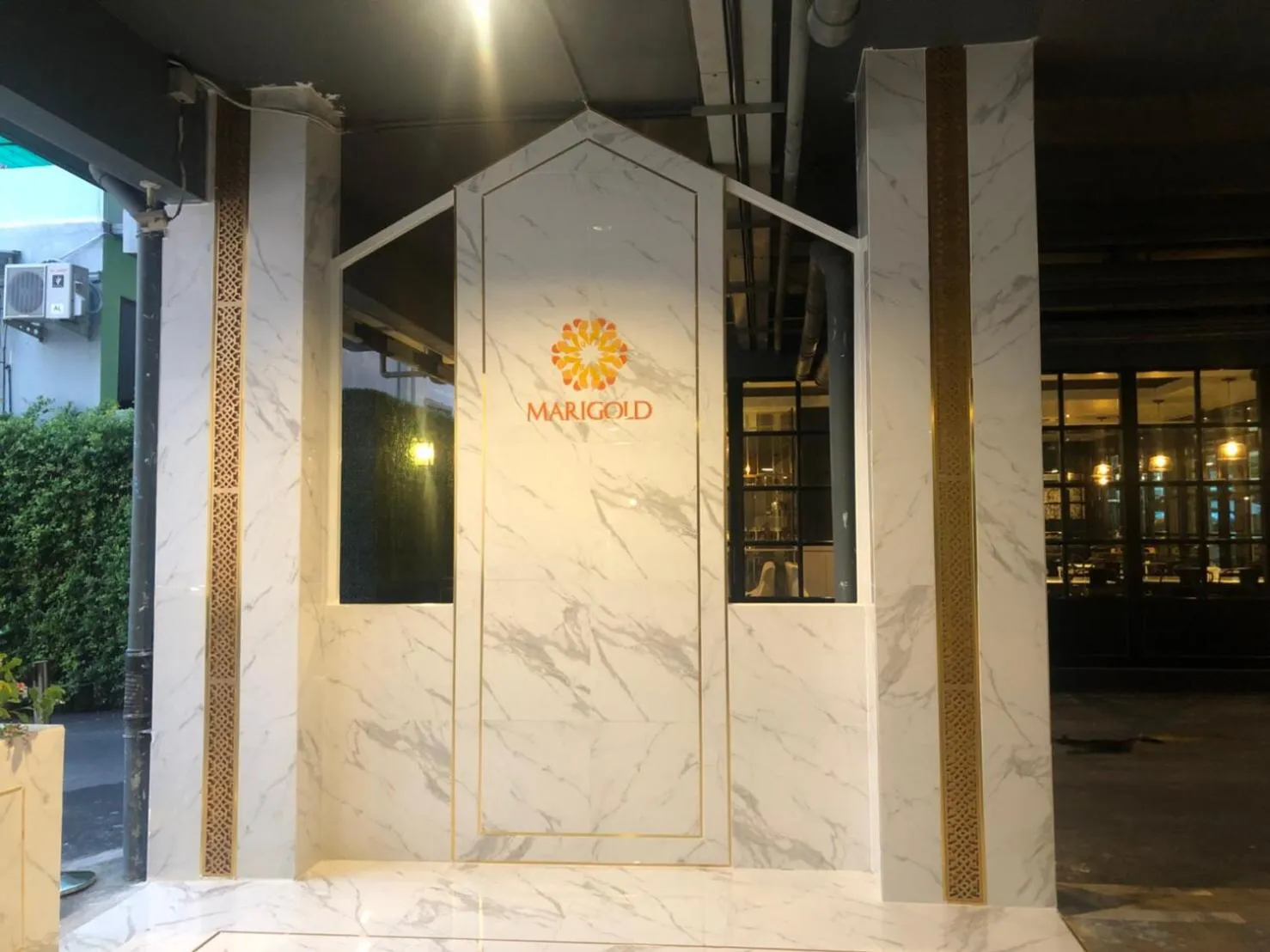 Facade/entrance in Marigold Sukhumvit - Free Shuttle to BTS Bearing Station