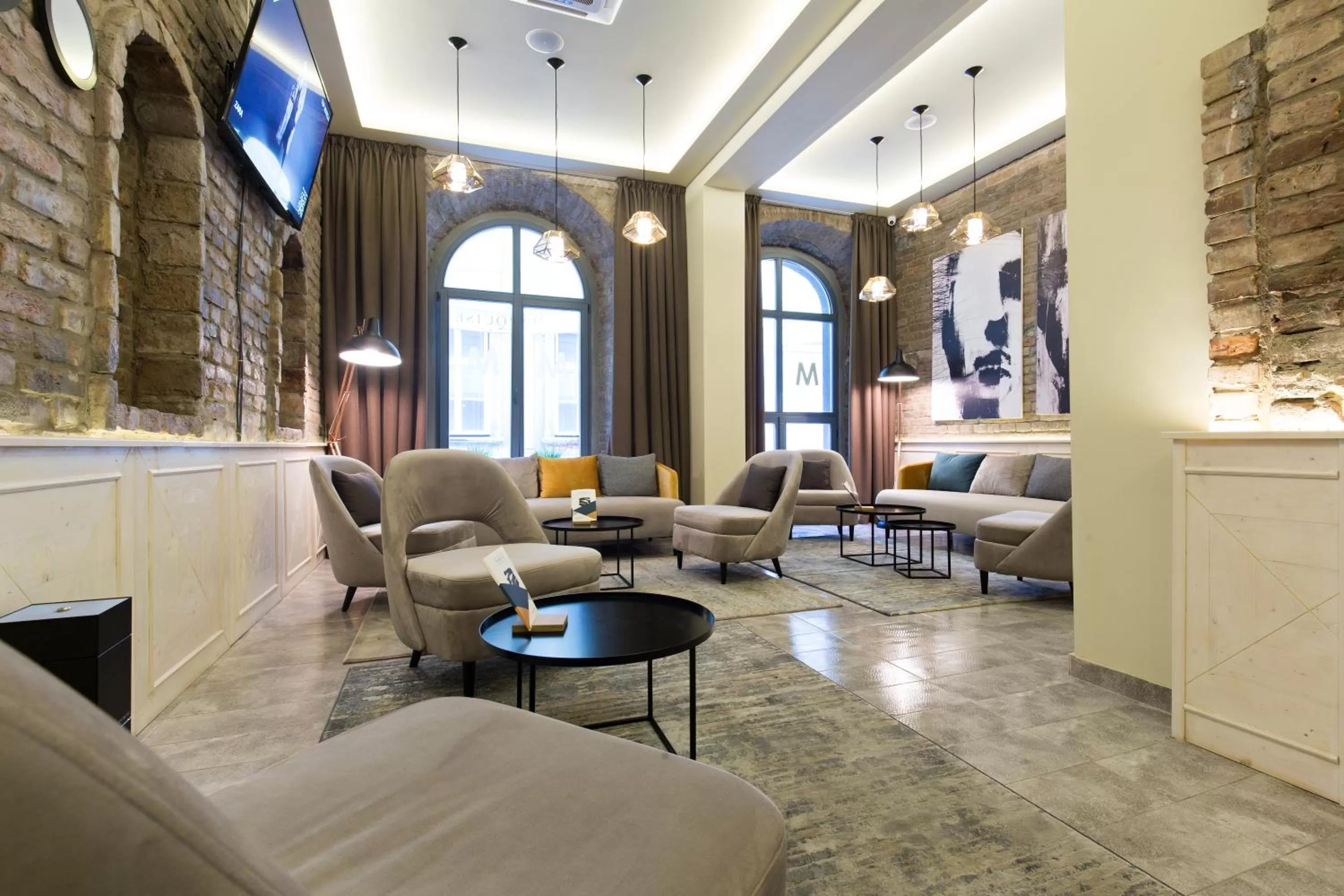 Communal lounge/ TV room in Marquise Hotel Garni