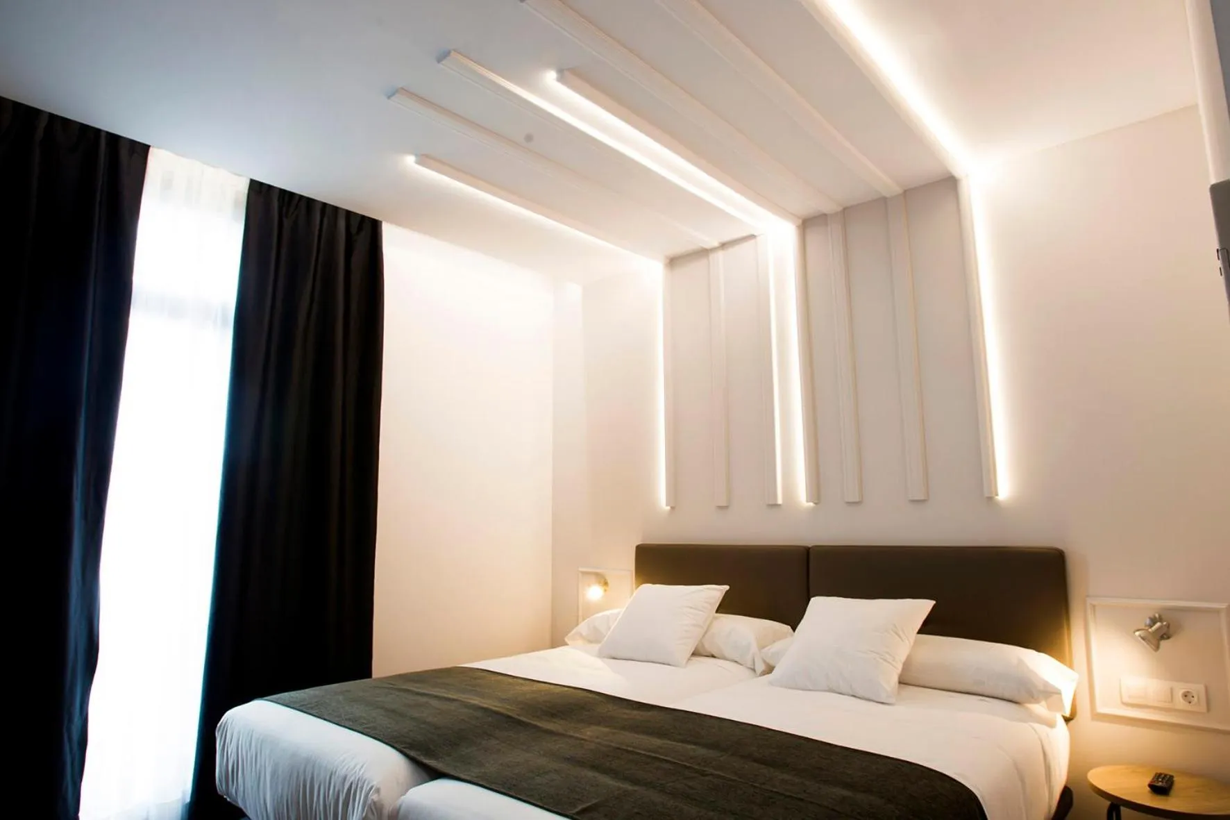 Photo of the whole room, Bed in Hotel Lux Santiago