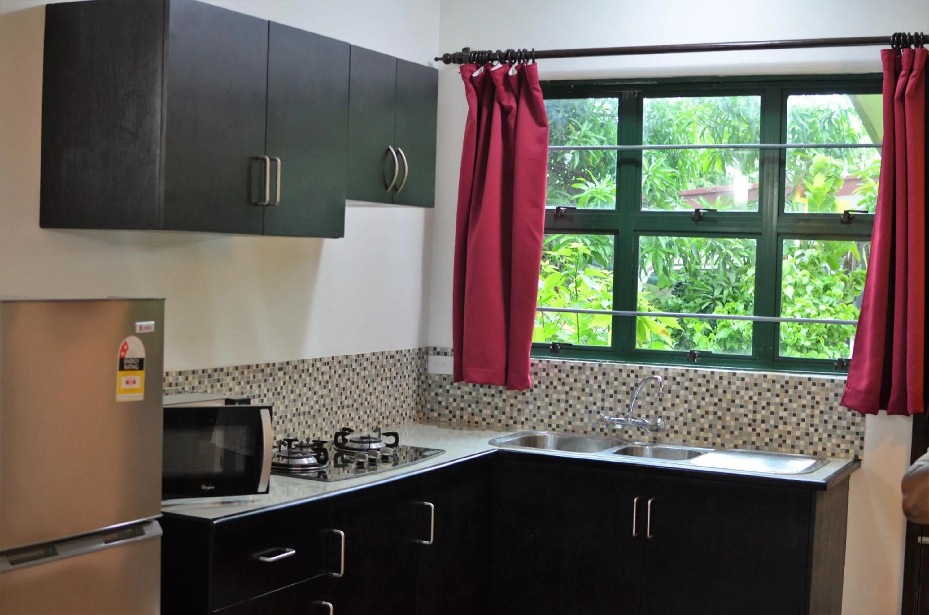 Kitchen or kitchenette in Grand West Villas