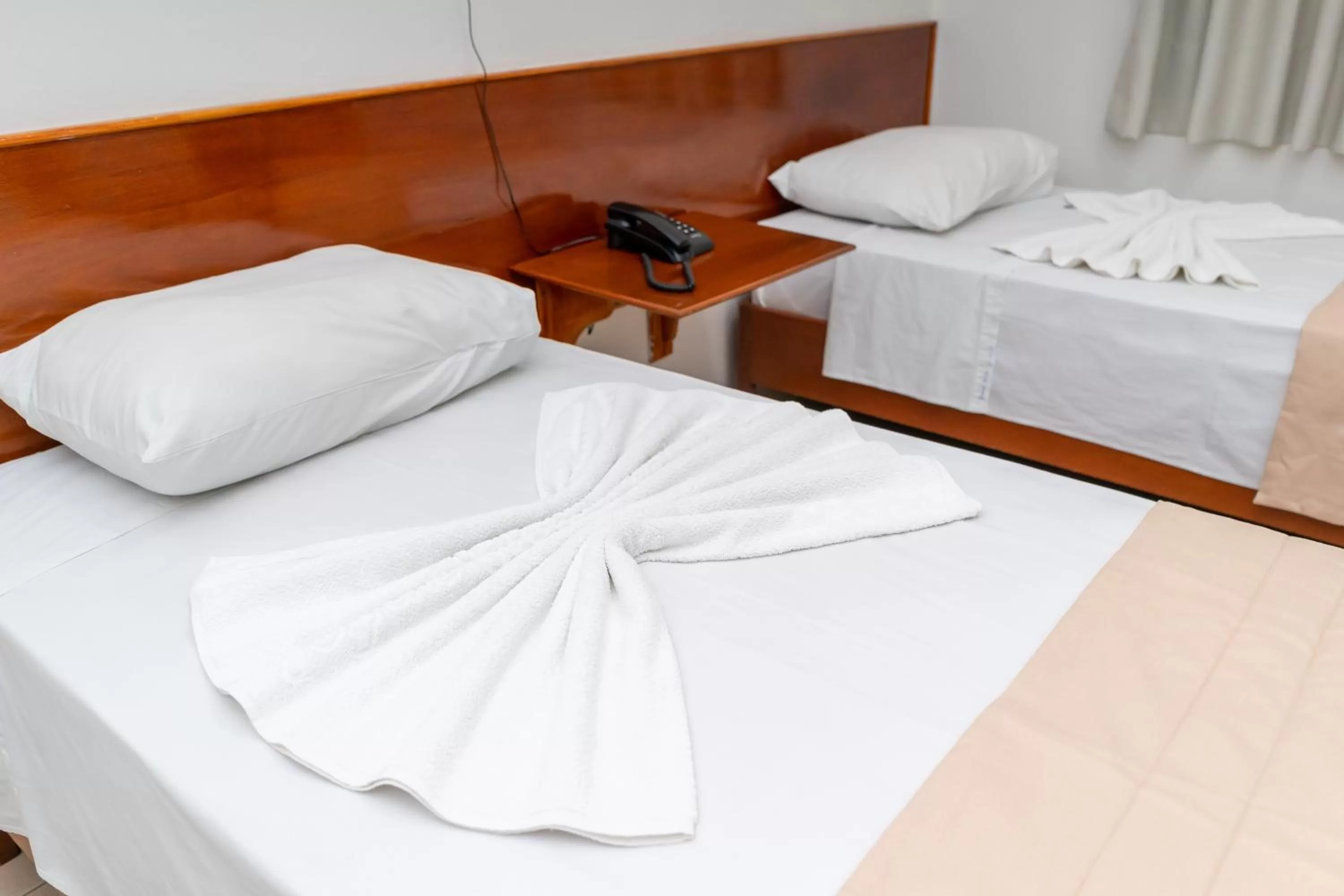 Bed in Bandeirantes Hotel