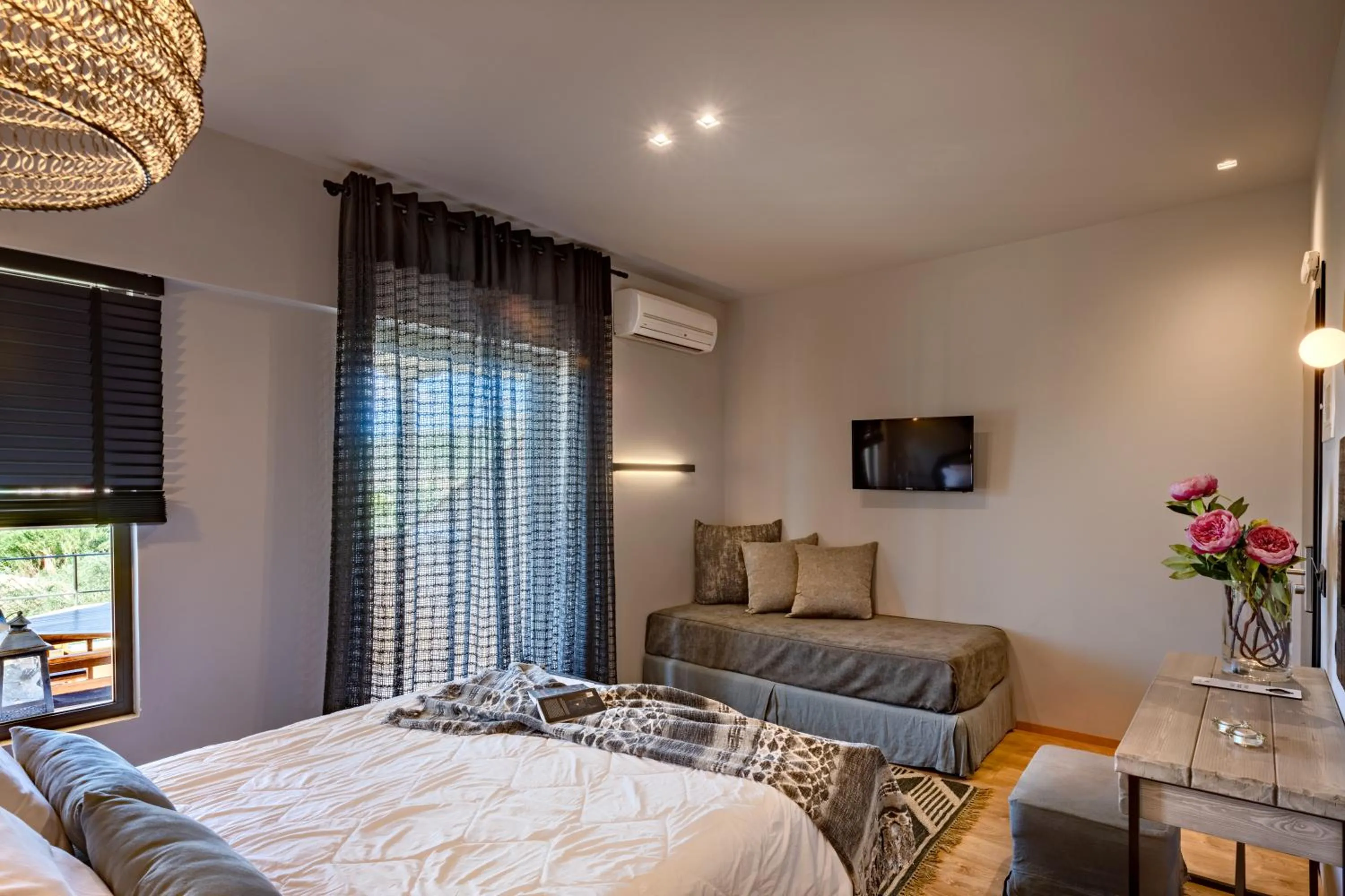 Bed in Anthemion Suites and Villas