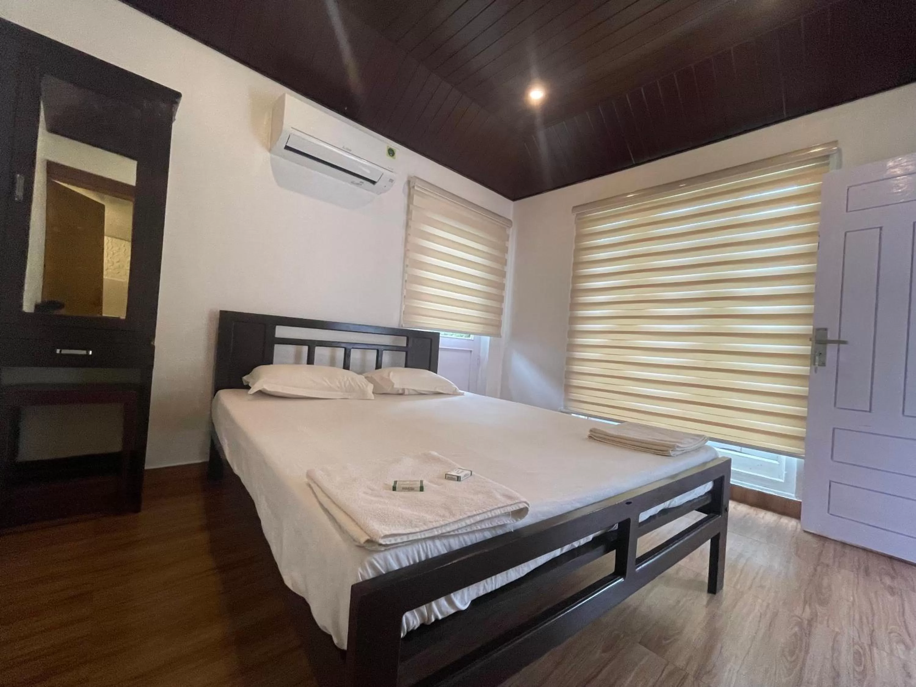 Bed in Garden Bay Resort