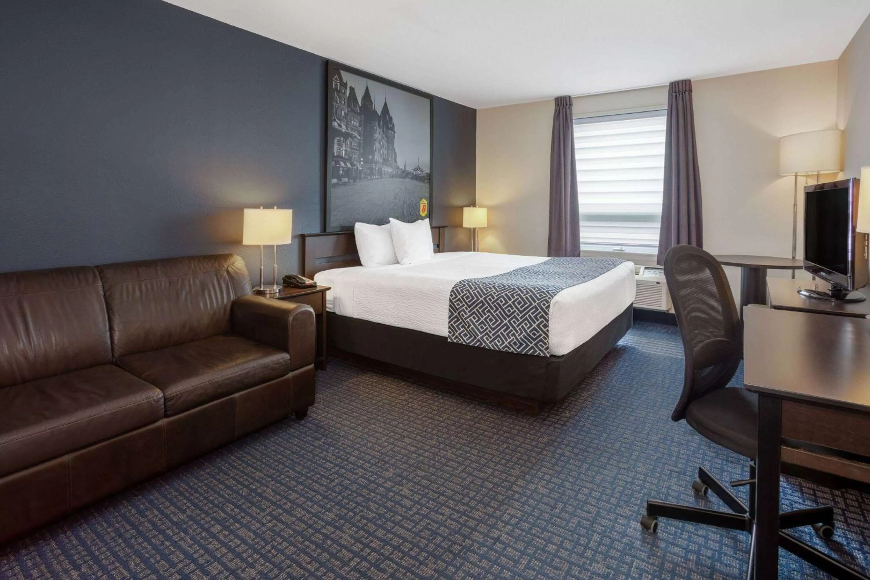 Photo of the whole room, Bed in Super 8 by Wyndham Lachenaie/Terrebonne