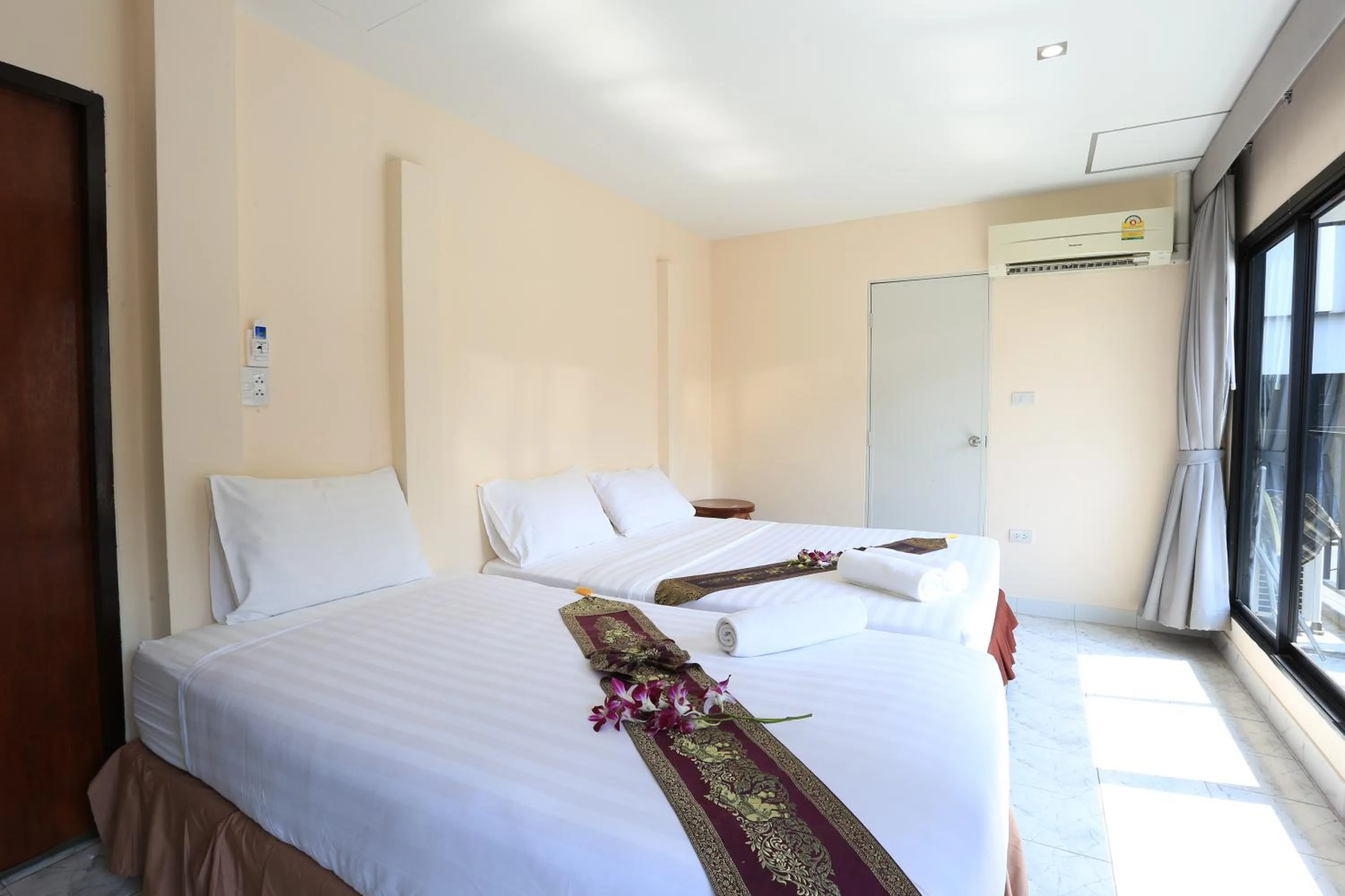 Bed in The Siam Guest House - SHA Extra Plus