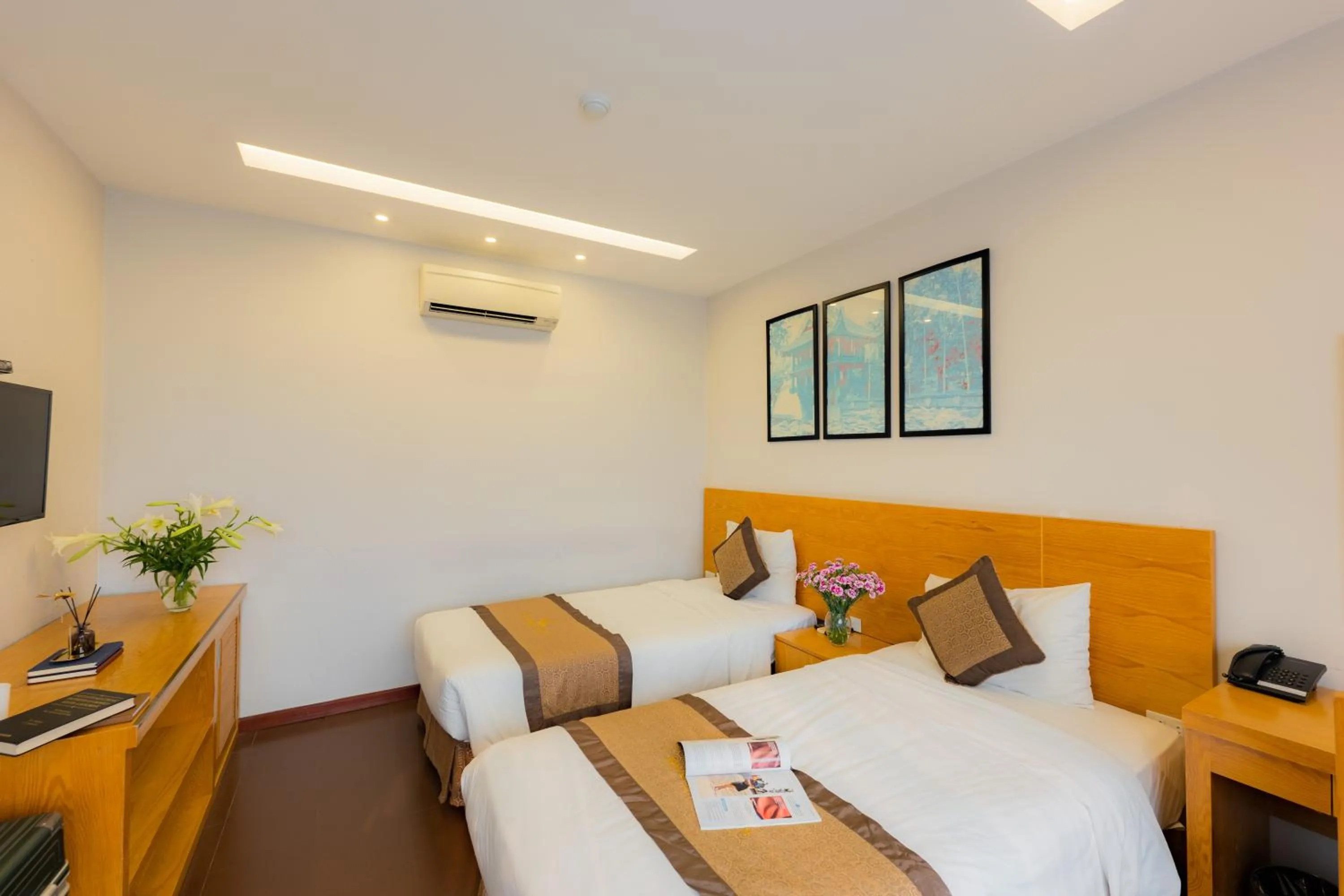 Bed in Riverside Hanoi Hotel