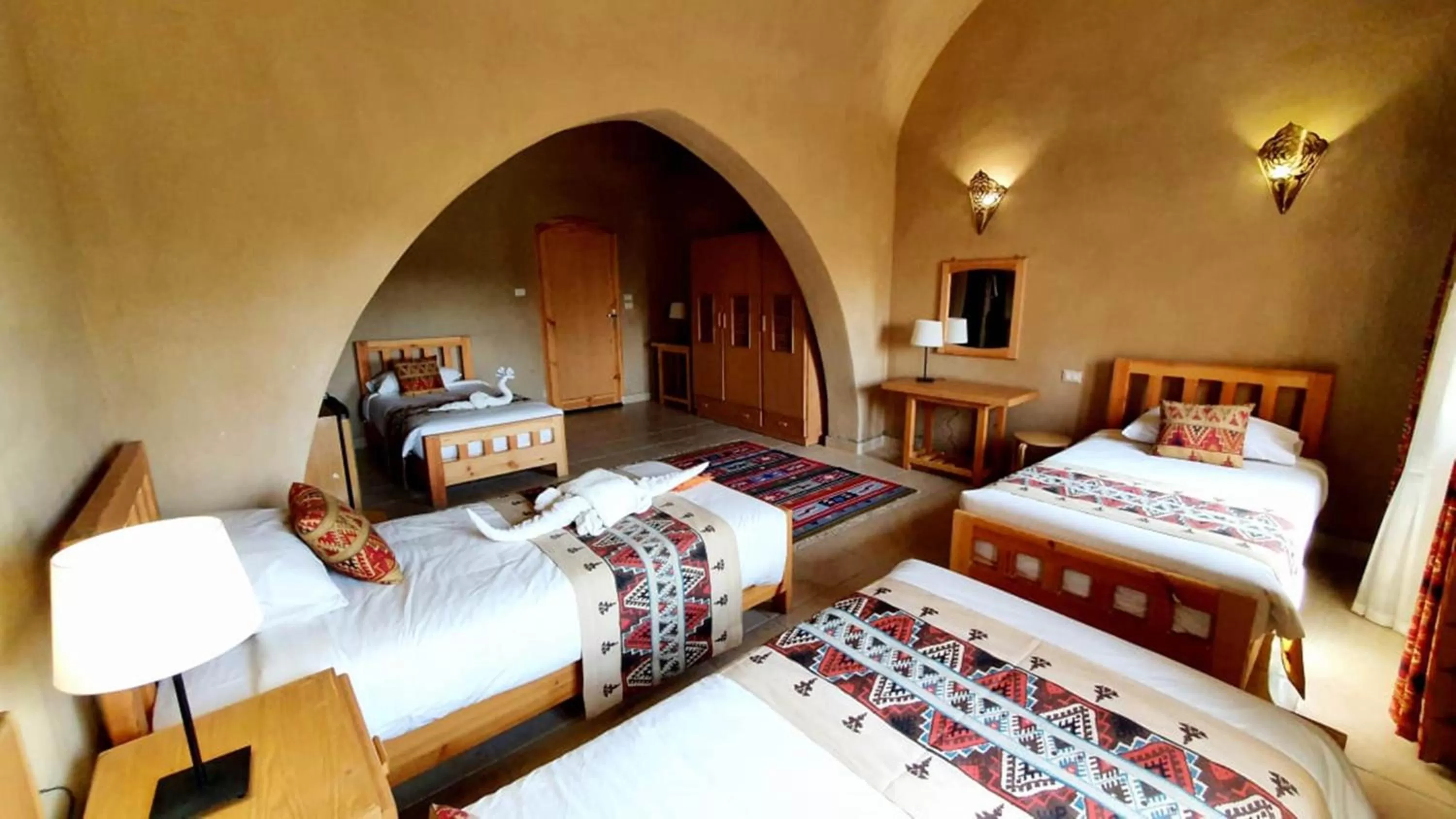 Bed in Embrace Hotel