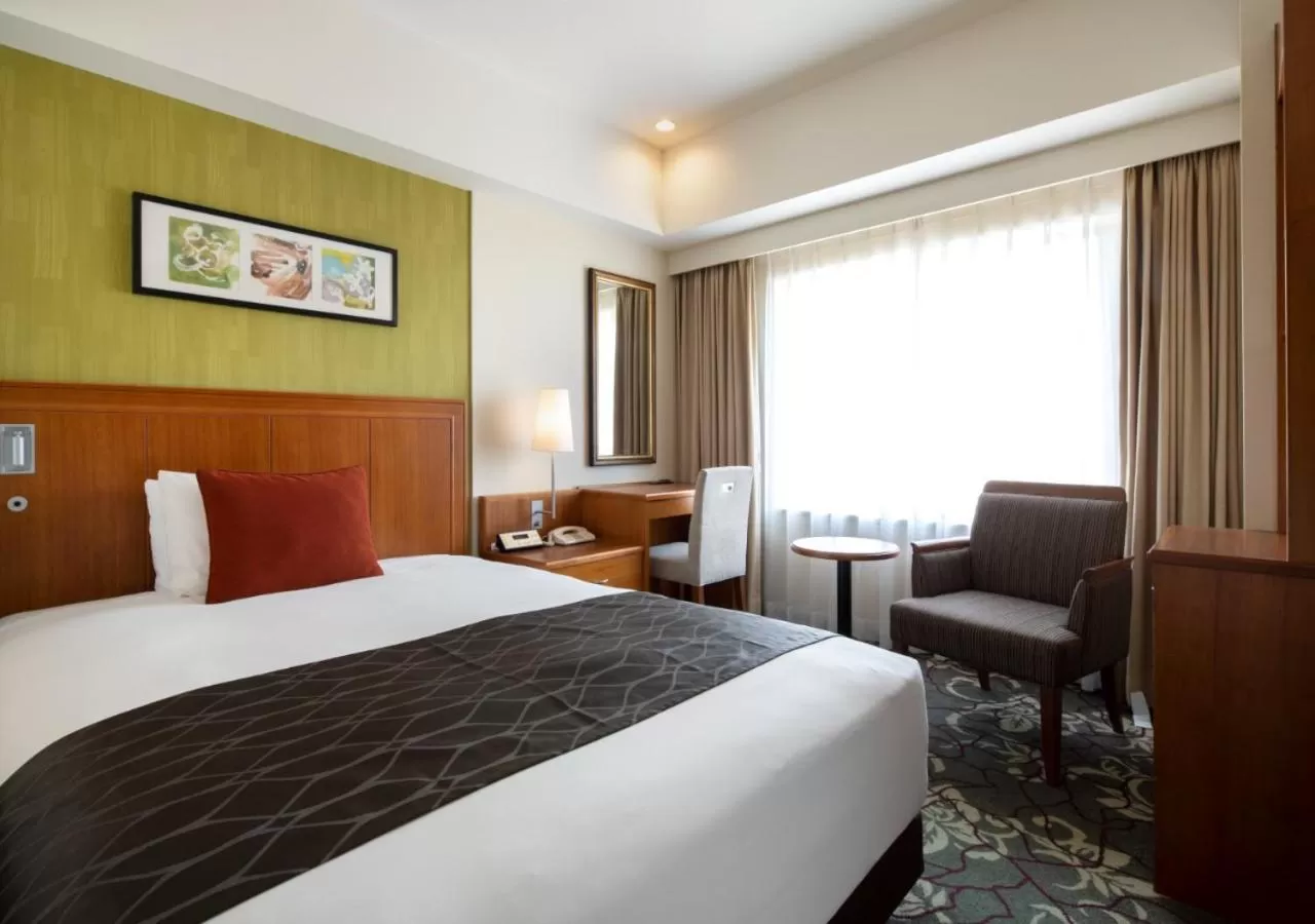 Bed in Hotel Metropolitan Tokyo Ikebukuro