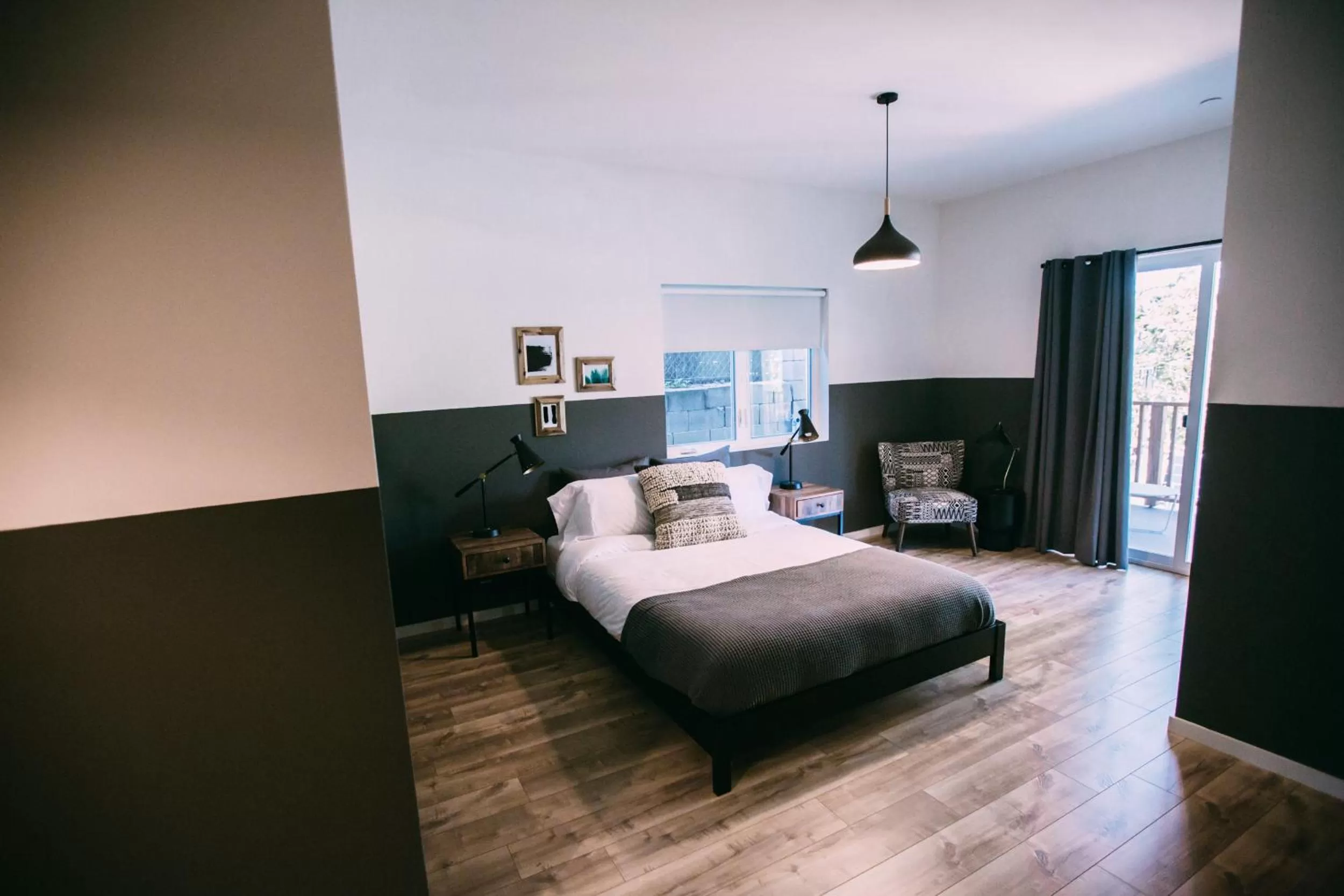 Photo of the whole room, Bed in Noon on Sunset Hill