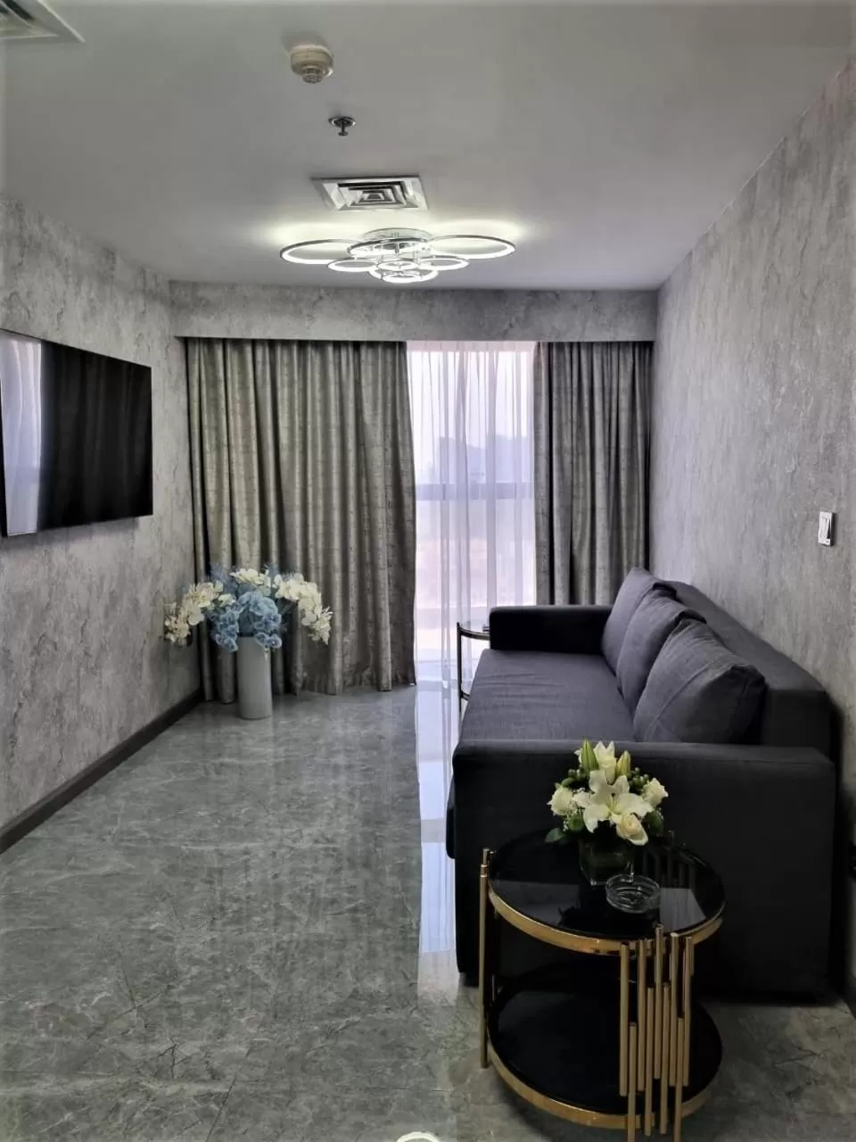 Living room in Majestic City Retreat Hotel