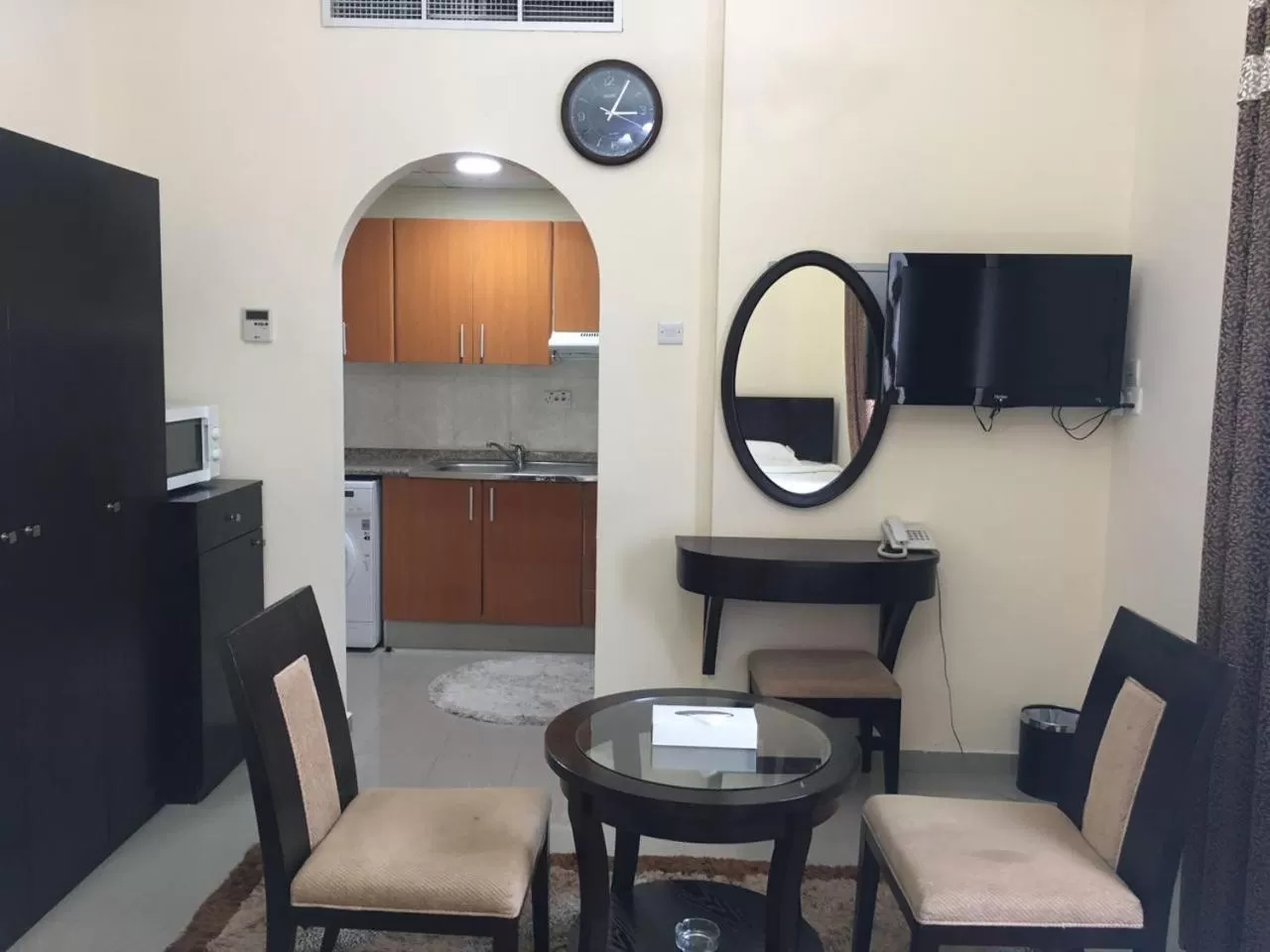 Kitchen or kitchenette in Al Smou Hotel Apartments - MAHA HOSPITALITY GROUP