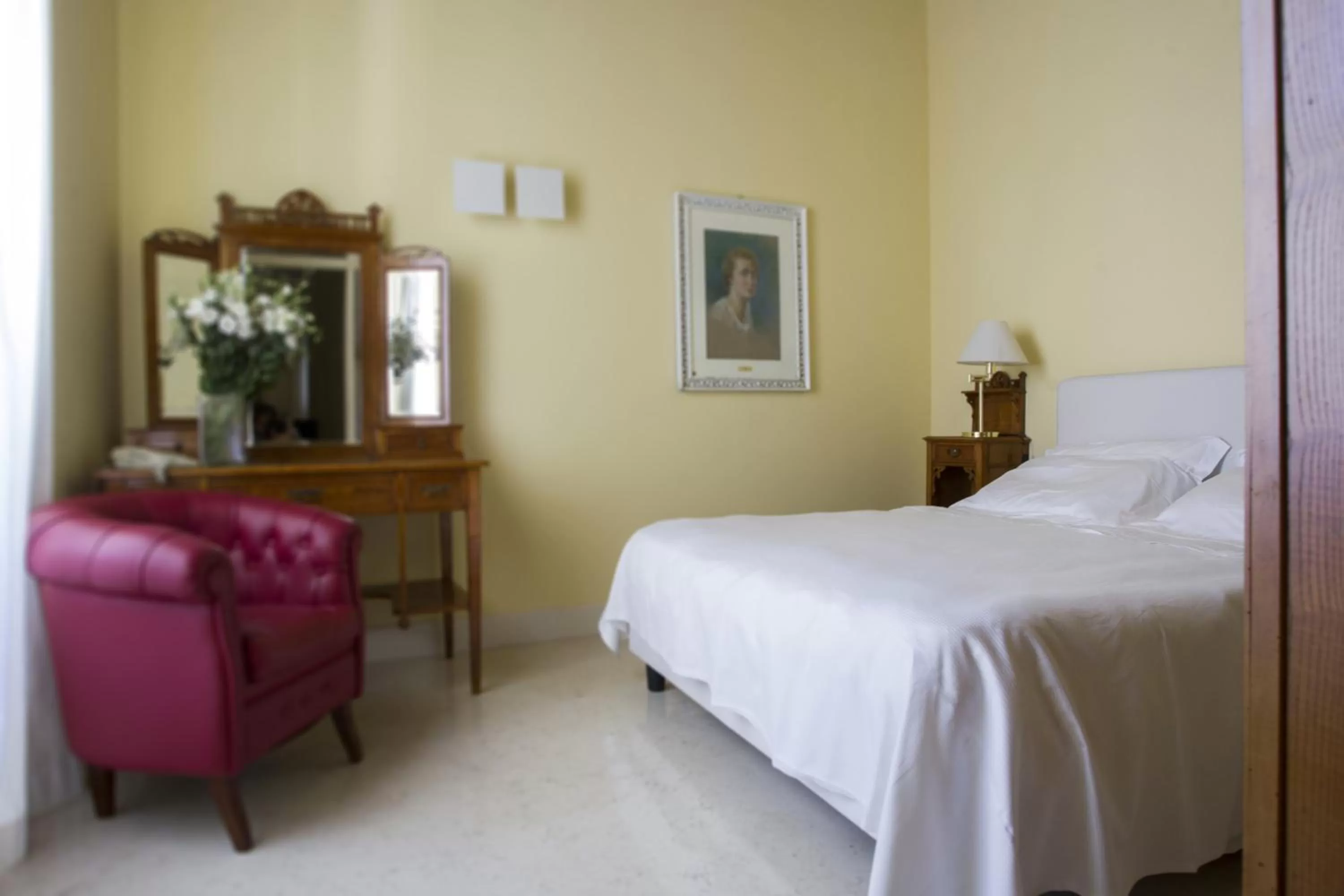 Bed in Palazzo Brunaccini Boutique Hotel
