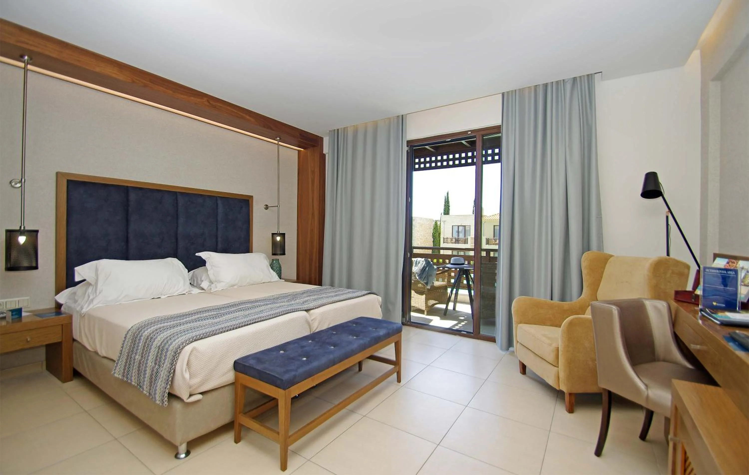 Bed in Mediterranean Village Hotel & Spa