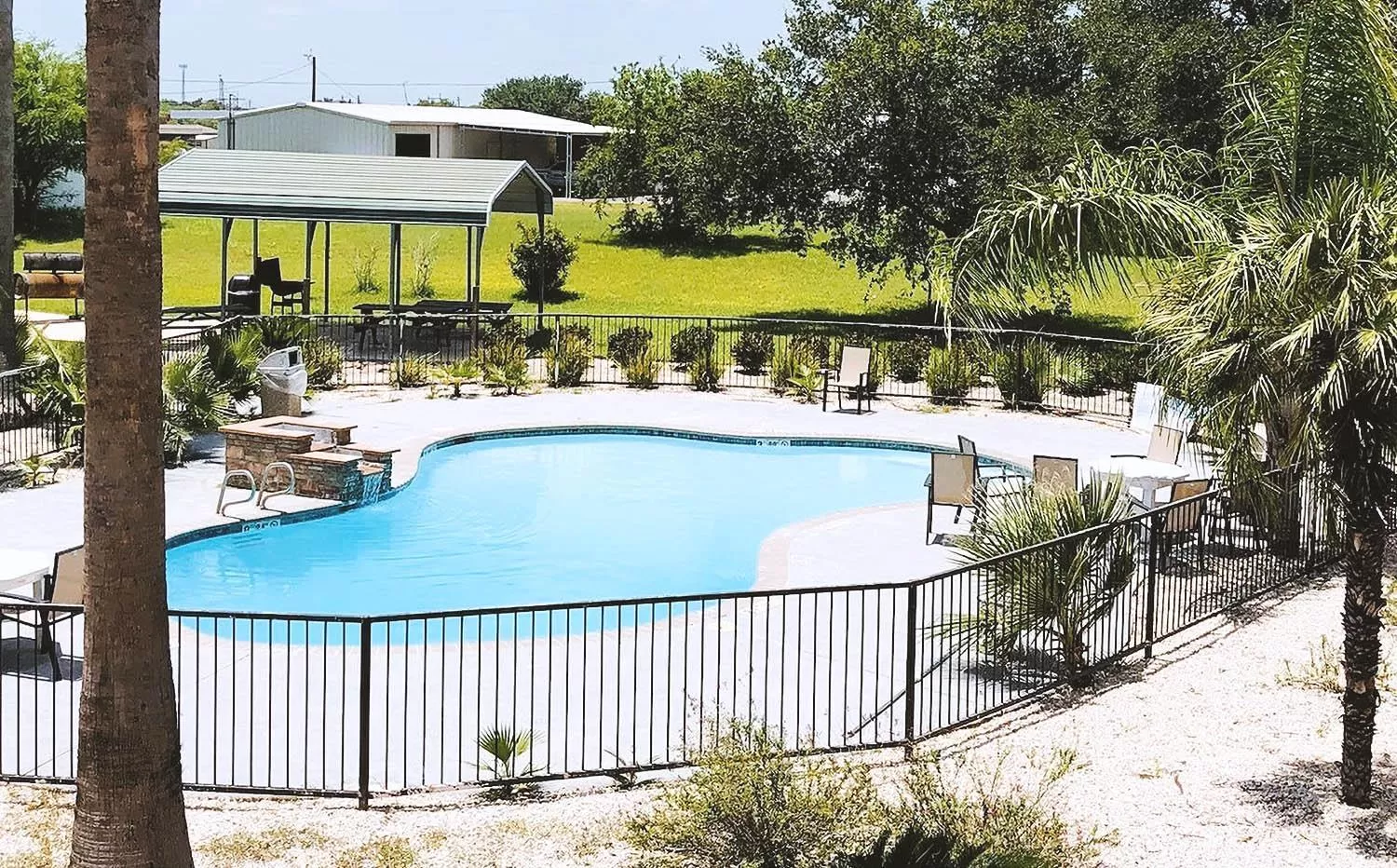 Pool view in Sky Palace Inn & Suites By Jasper Beeville