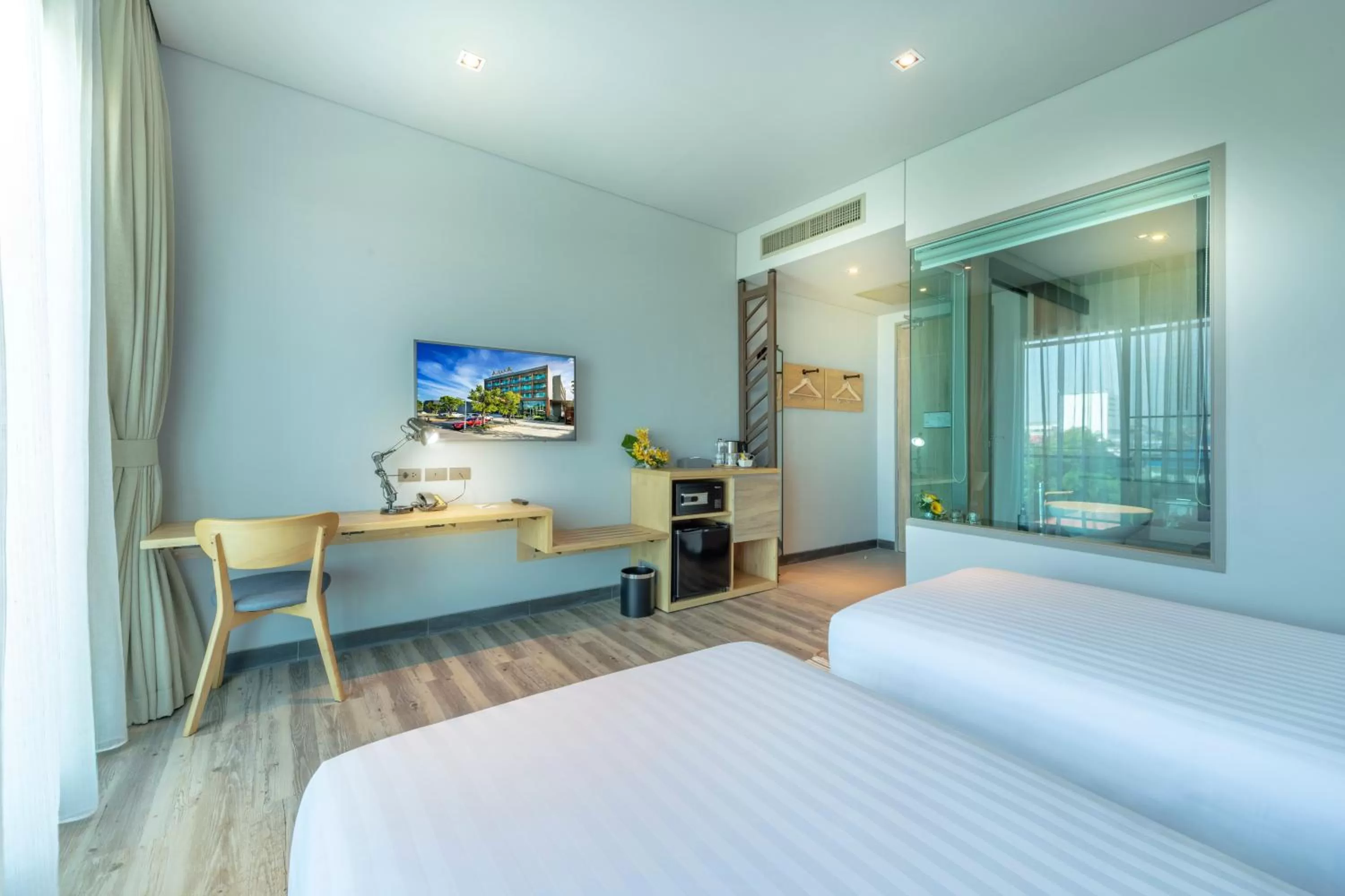 TV and multimedia, Bed in AisanA Hotel Korat