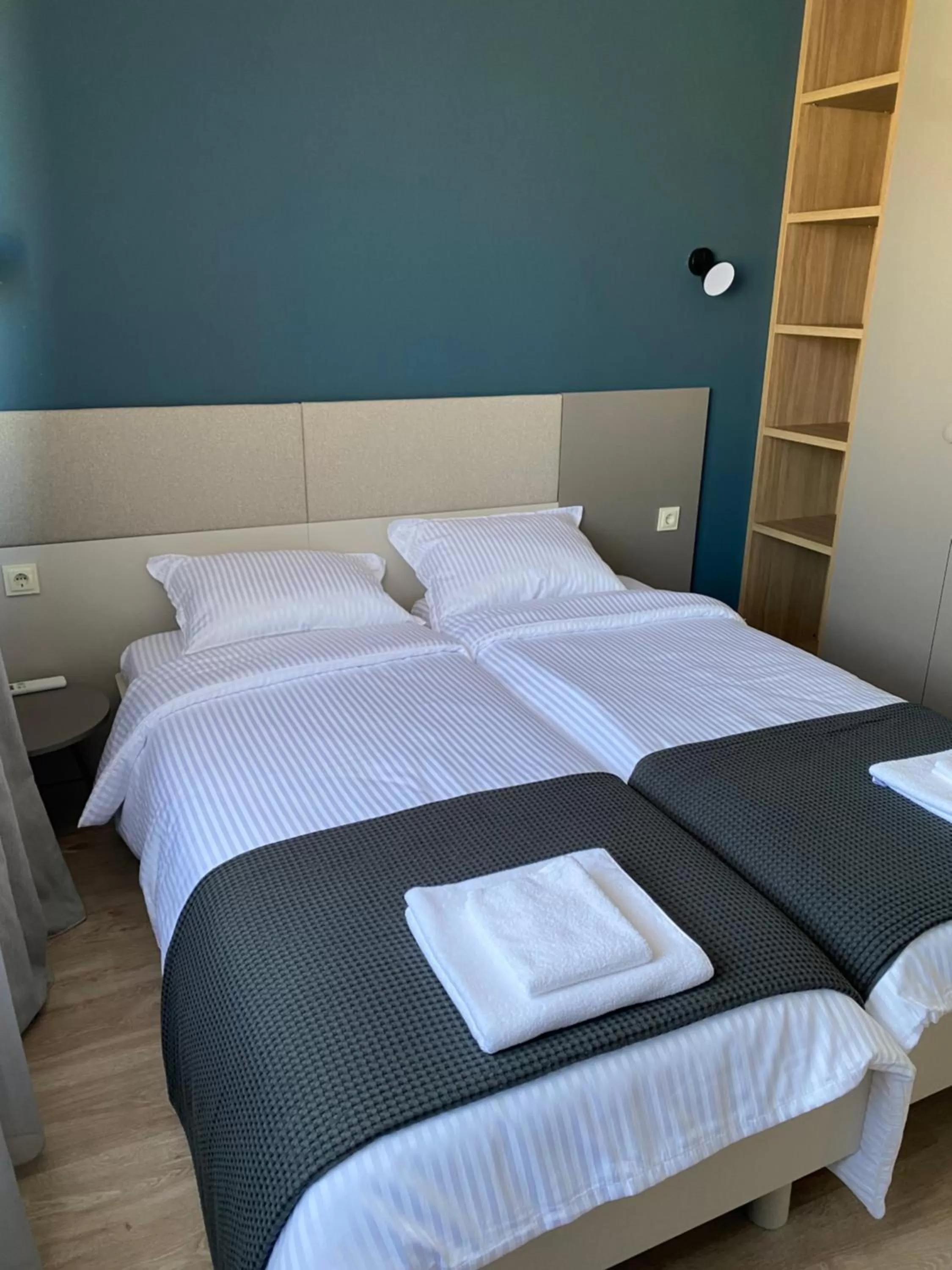 Bed in 7th Sense boutique apartments