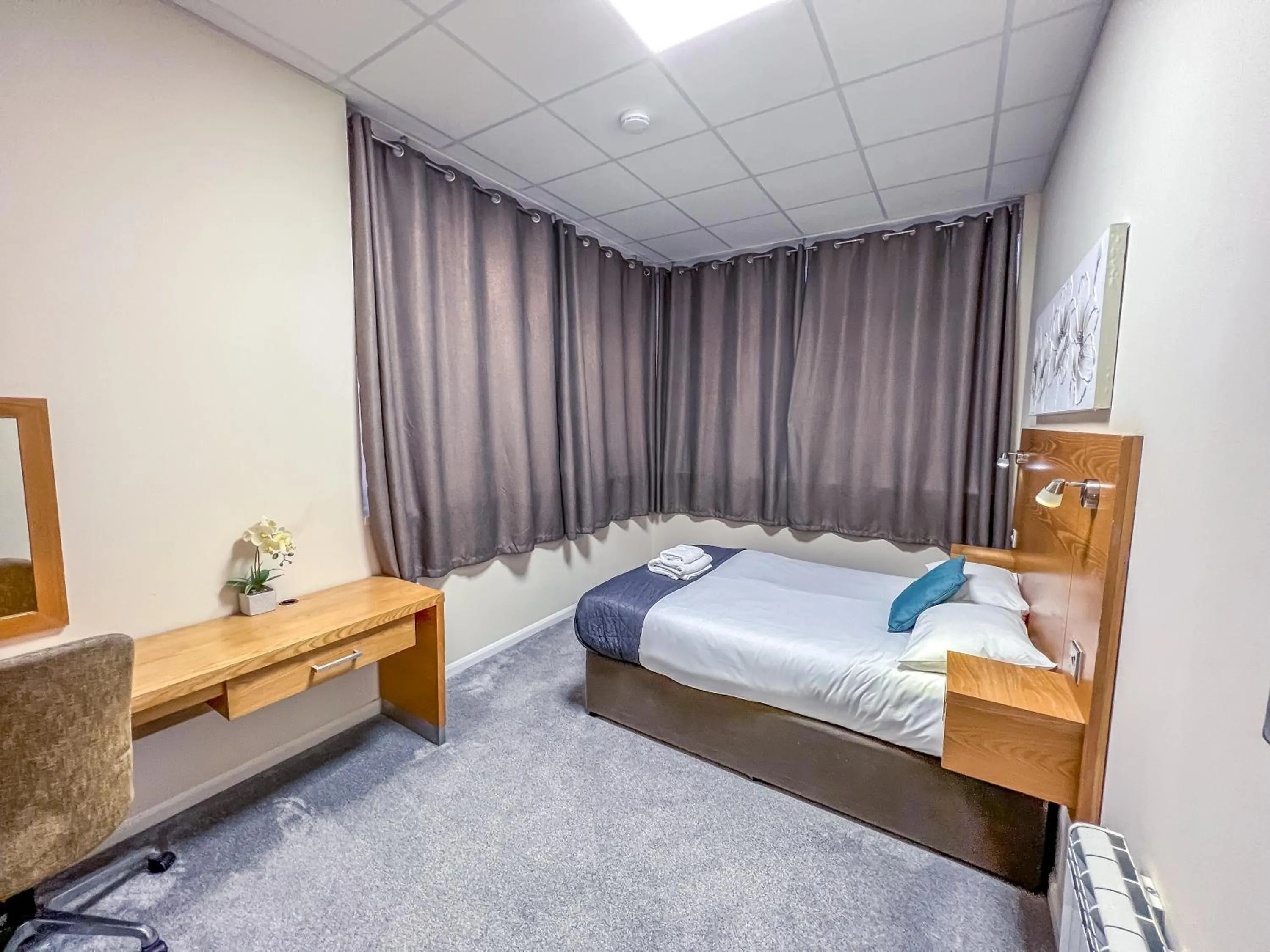 Bedroom in County Hall Apartment Hotel