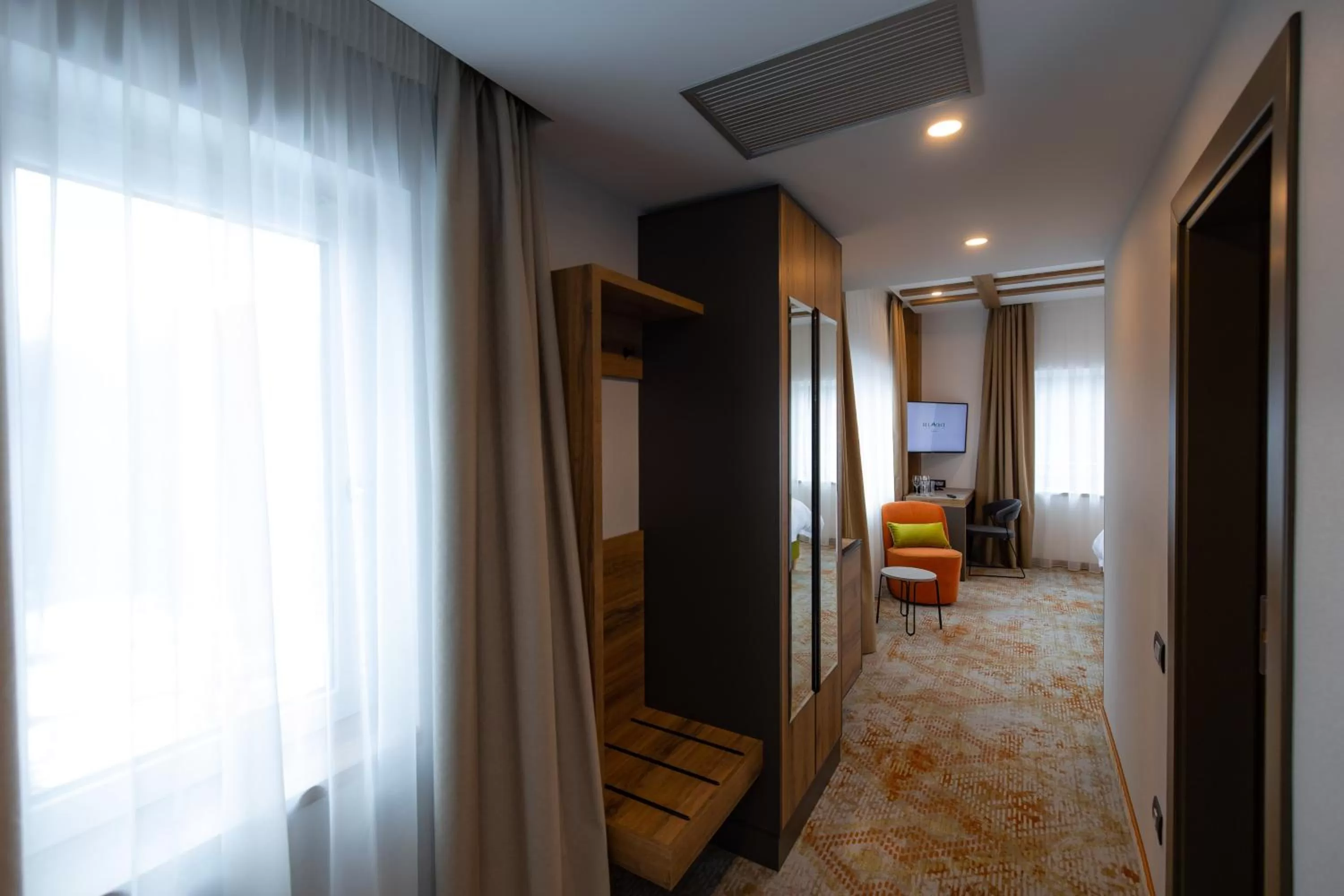 Seating area, Bed in Hotel Belmont & Spa