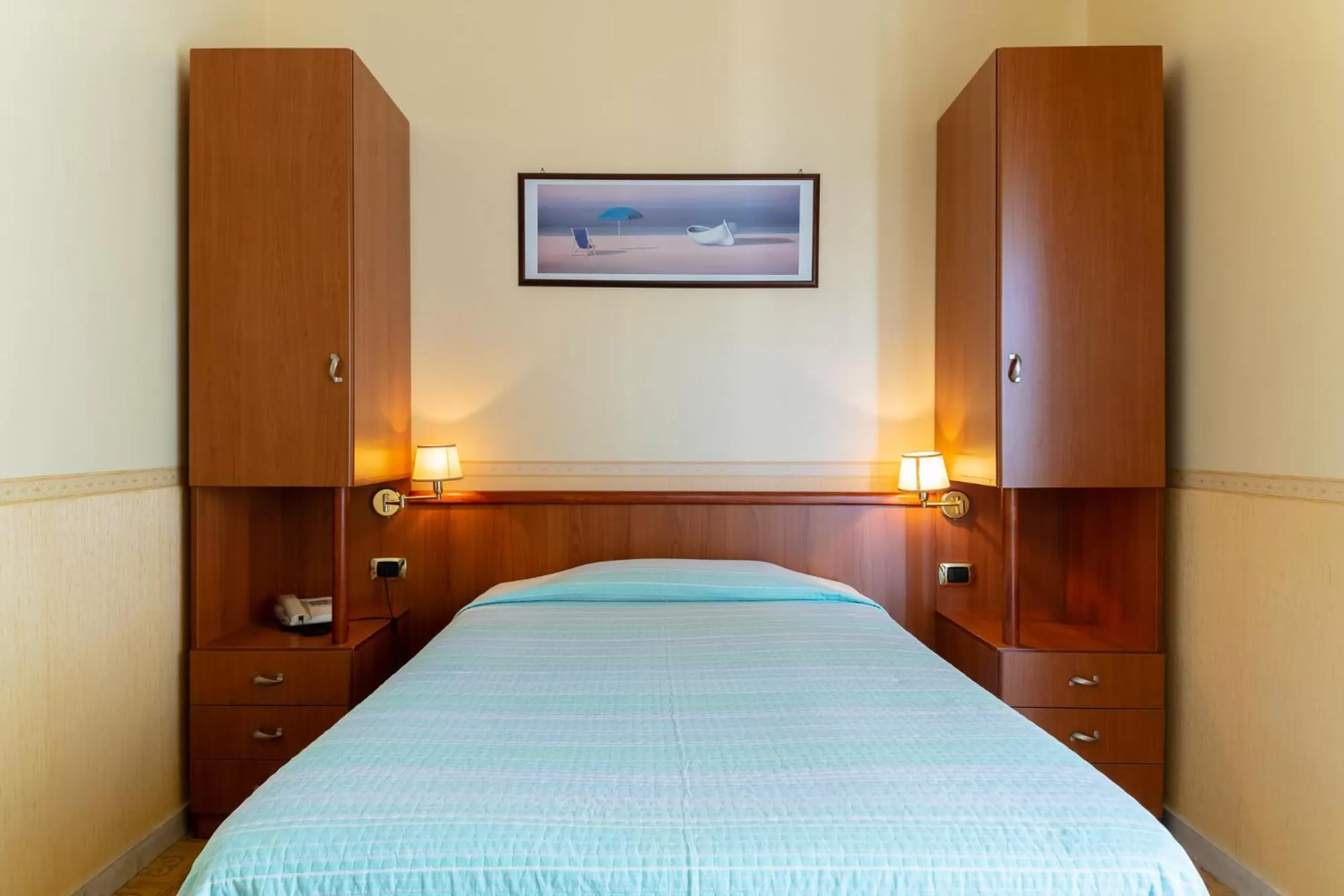 Bed in Hotel Riviera